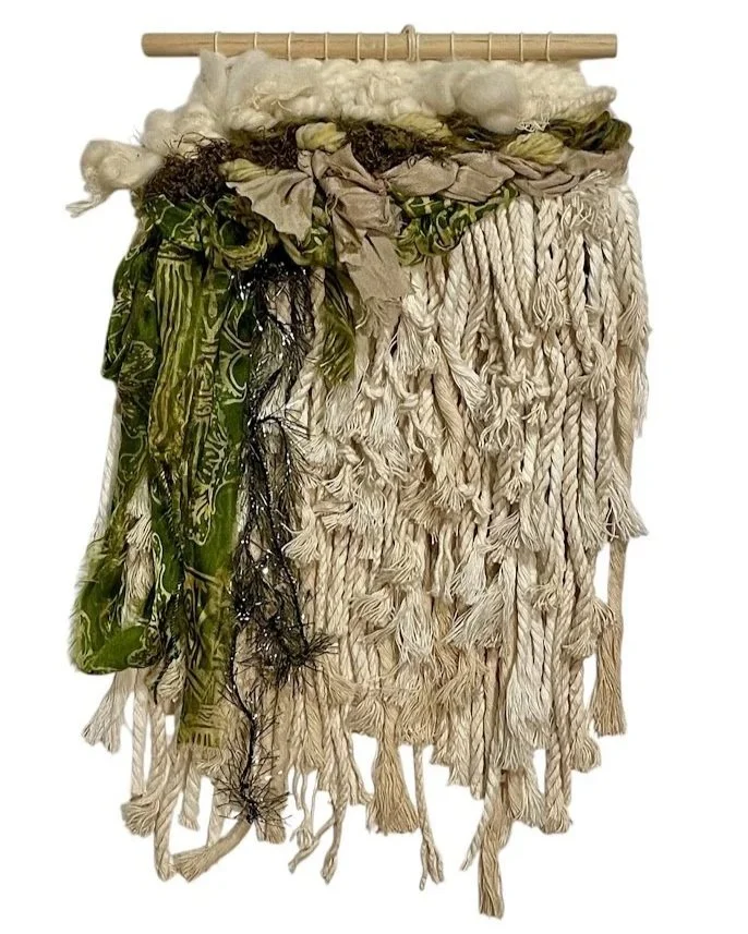 "Floral Fete", Handwoven (Wool, handspun yarn, cotton, silk). Hung from a wooden dowel, 7"w x 16" h.   $225