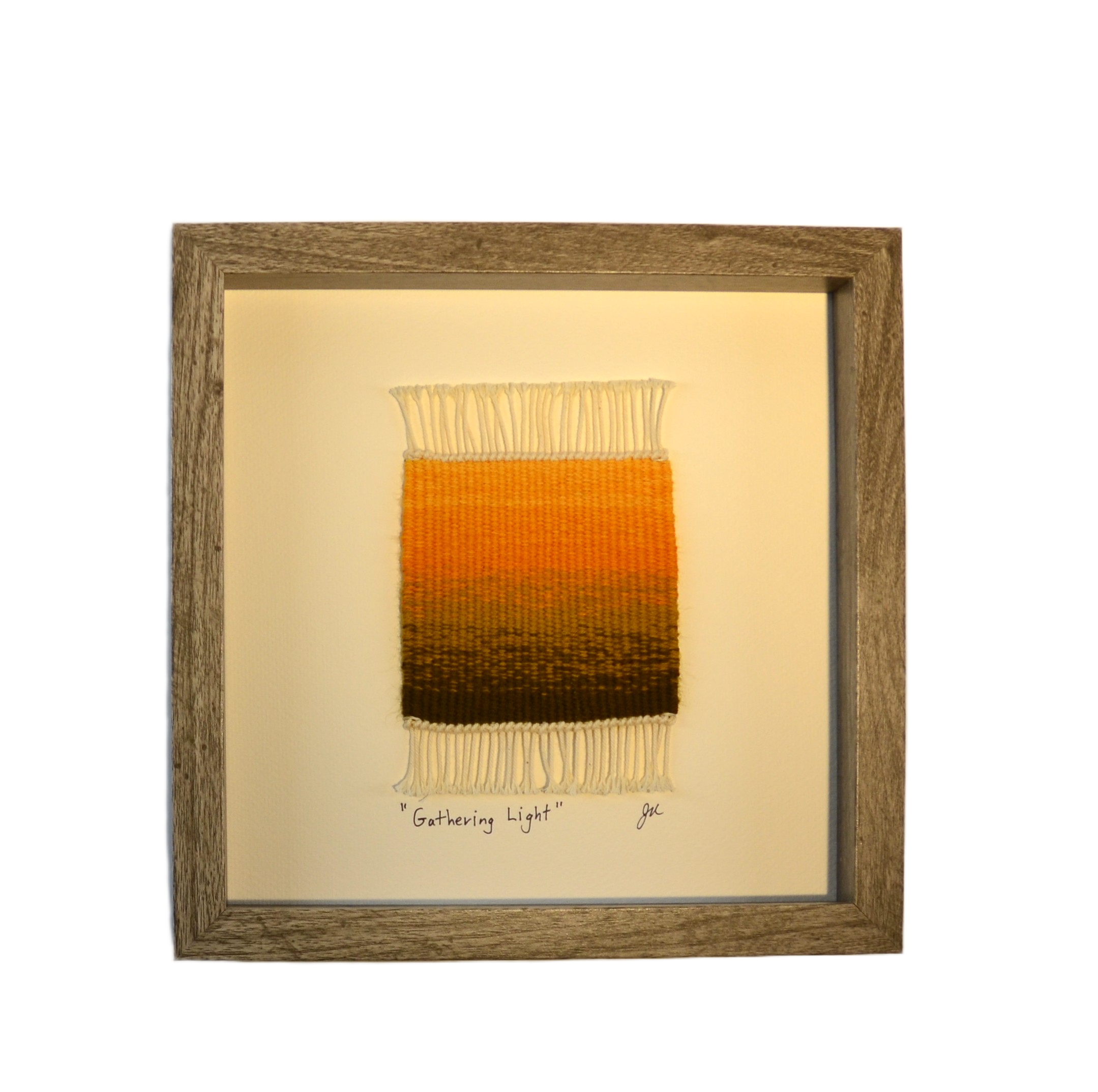 SOLD - "Gathering Light", Handwoven (Wool), mounted  in a 10" x 10" x 1-3/4" gray wooden shadow box frame.  $150 CAD