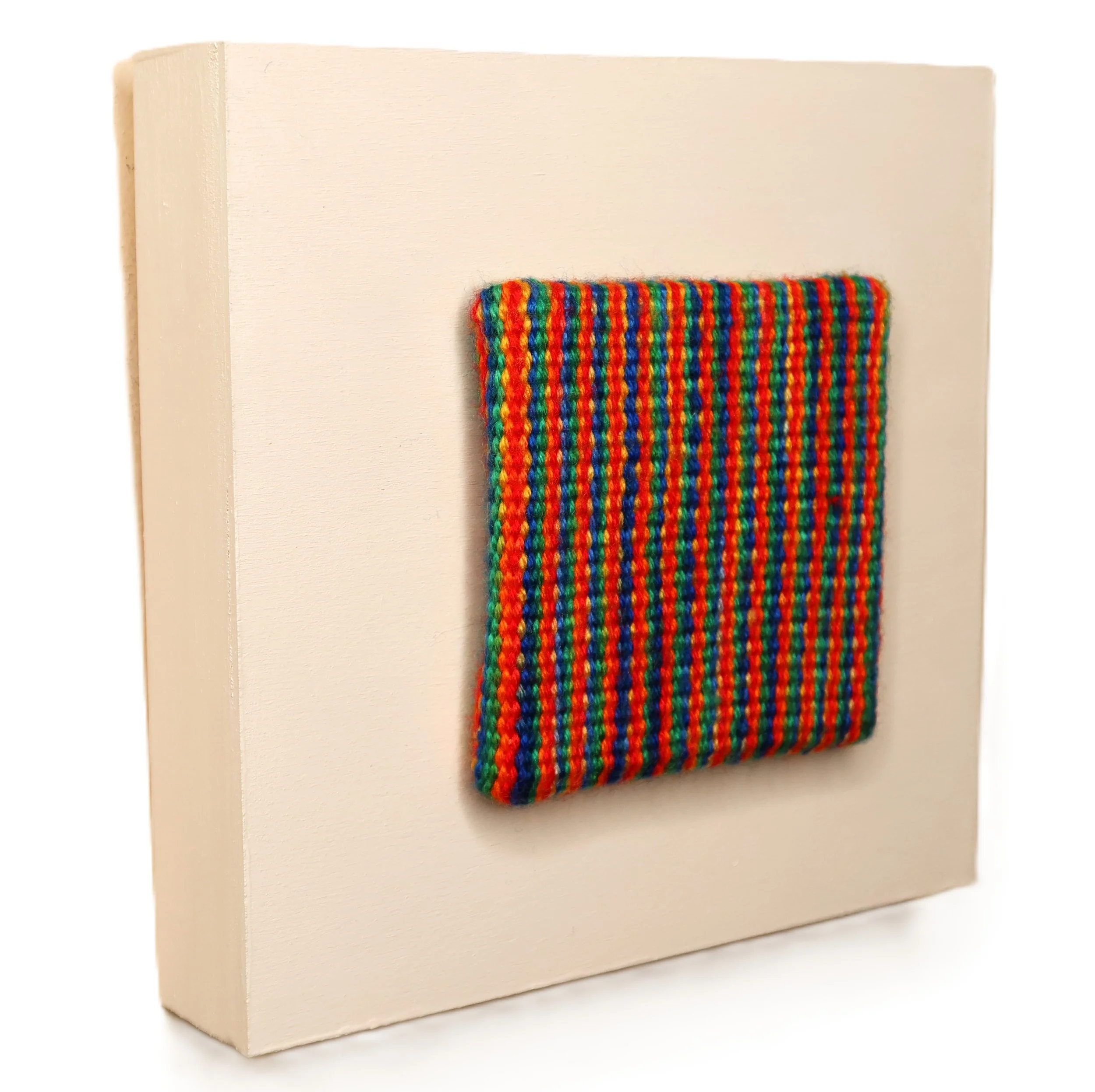 "Line Dance", Handwoven (Wool). Mounted on an 8" x 8" x1-5/8" painted wood cradle, $150