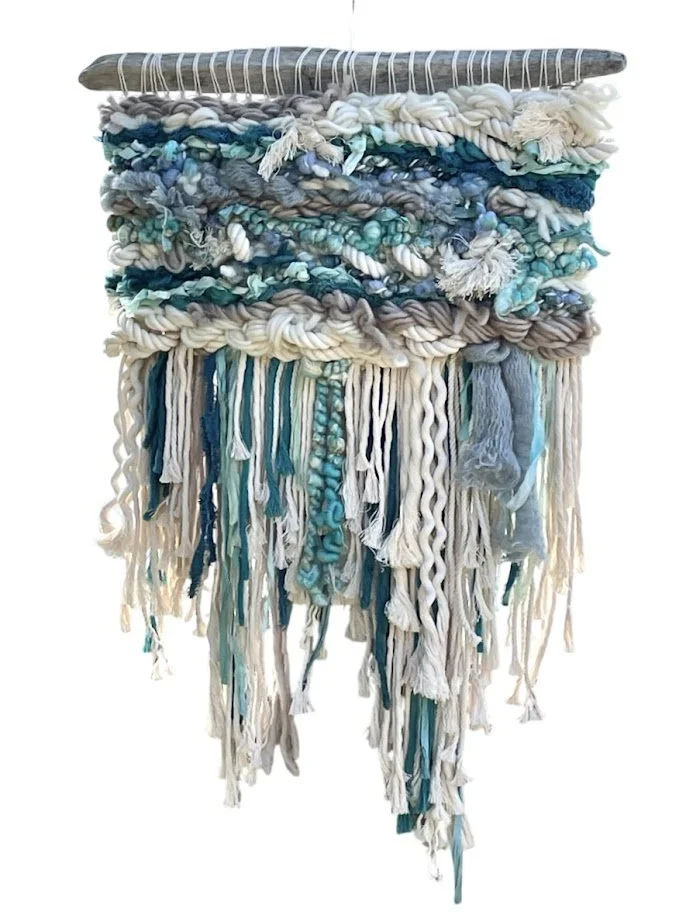 "Water's Edge", Handwoven (Wool, handspun yarn, cotton, sari silk). Mounted on foraged driftwood, 21.5" w x 29" h.  $950