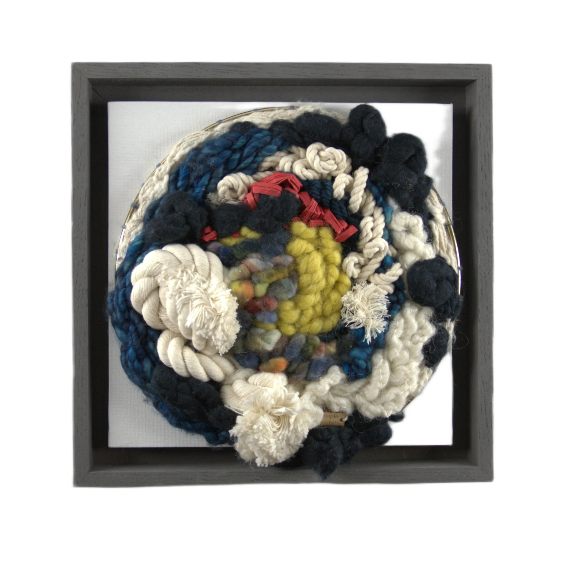 "Ahoy There", Handwoven (Wool, cotton, paper raffia). Mounted in a 9.75" x 9.75" charcoal gray wooden frame without glass.  $250