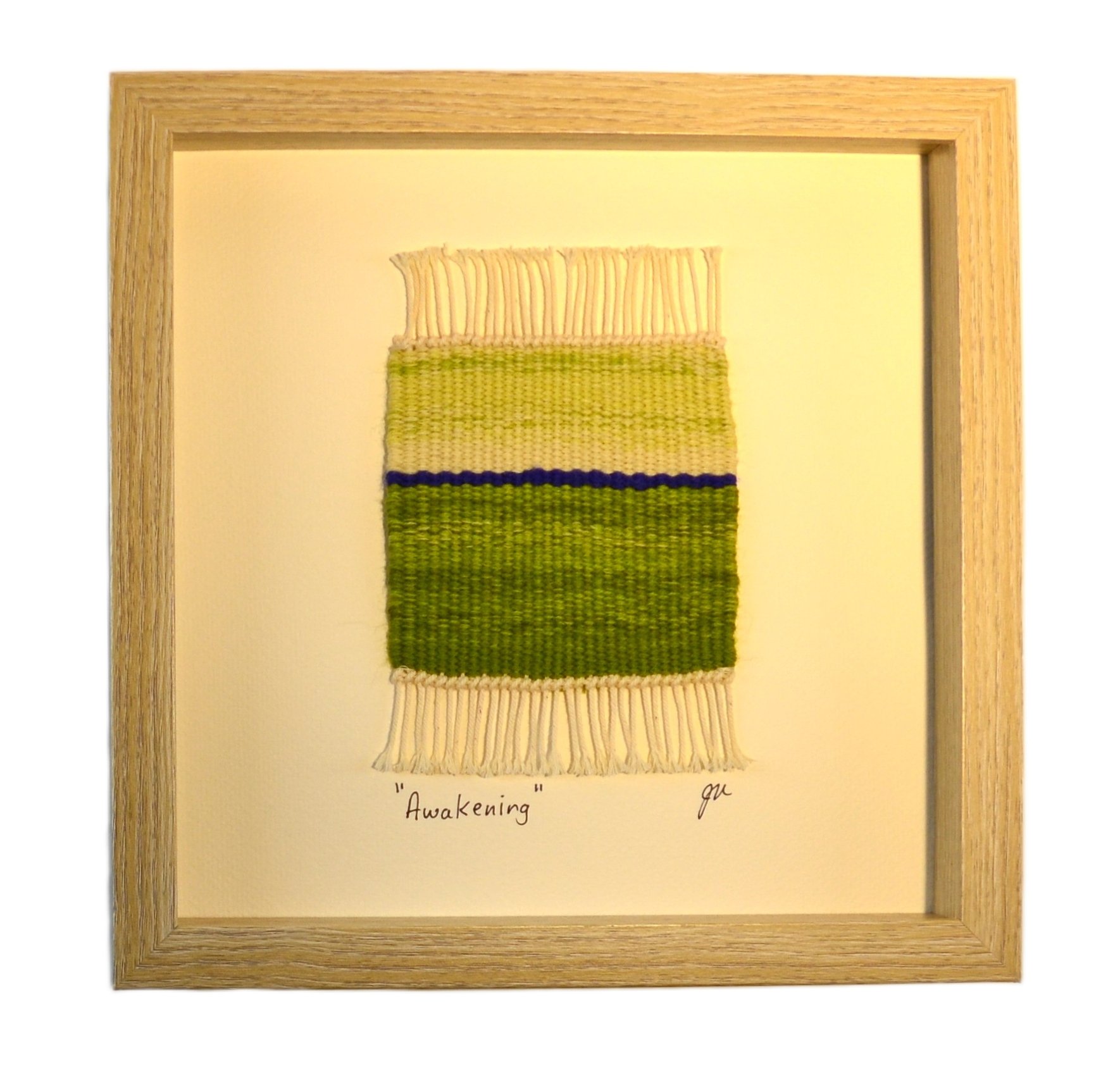 "Awakening", Handwoven (Wool), mounted  in a 10" x 10" x 1-3/4" blonde wooden shadow box frame.  $150 CAD