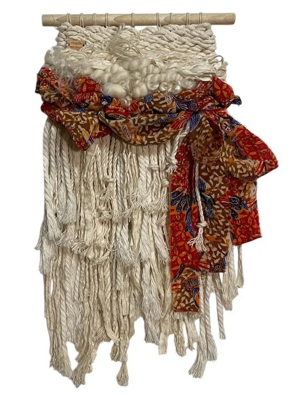 "Sunkissed", Handwoven (Wool, handspun yarn, cotton, silk). Hung from a wooden dowel, 7"w x 16" h.   $225