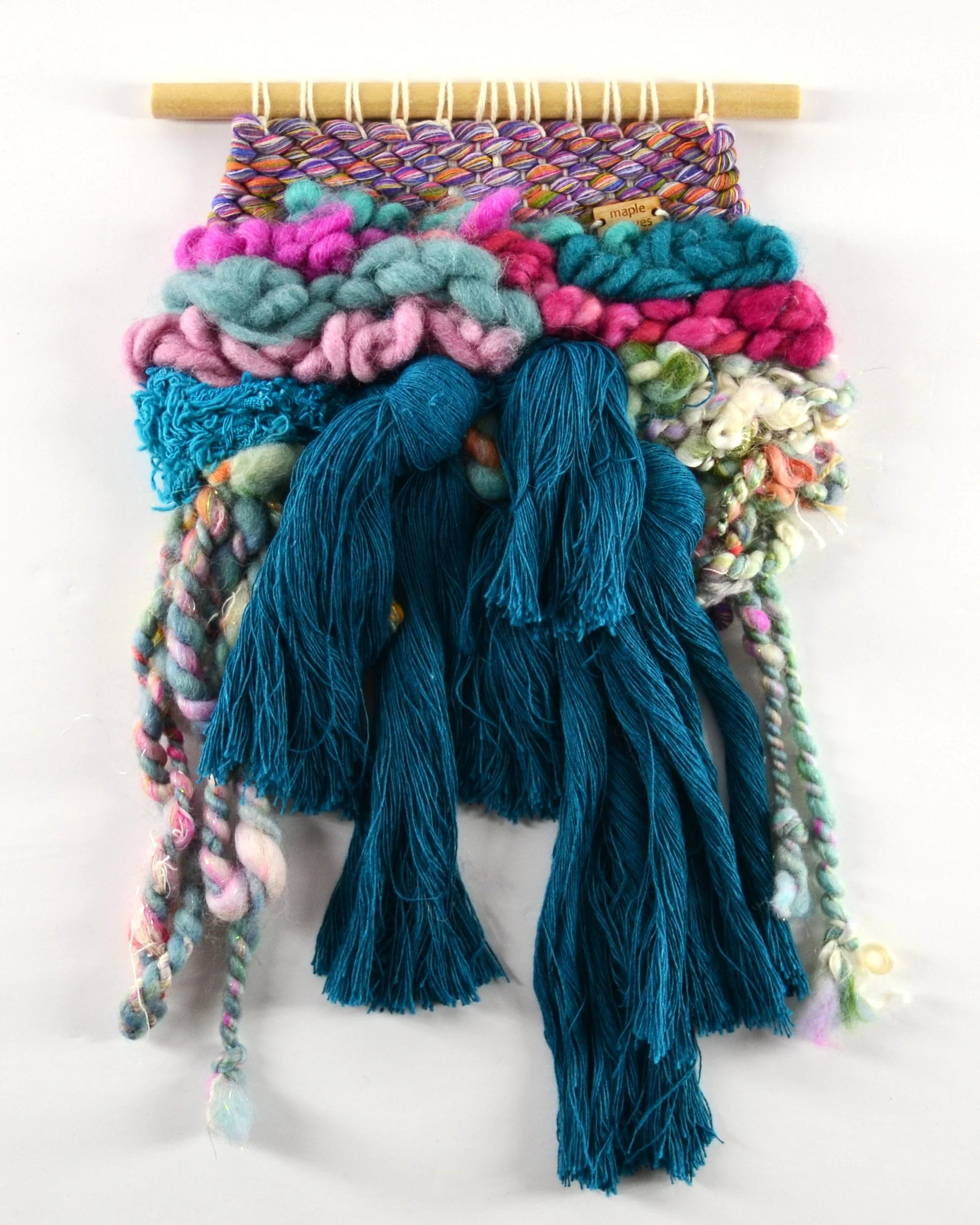 "Jardin", Handwoven (Wool, handspun yarn, cotton). Hung from a wooden dowel. 7" w x 12" h. $75