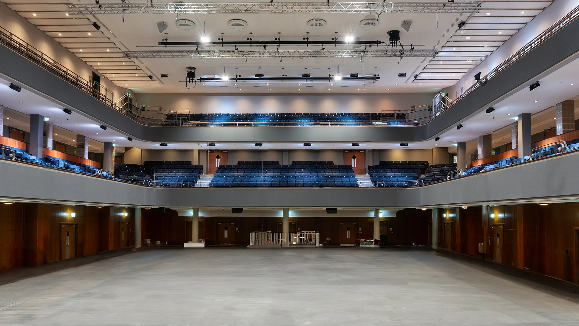 Refurbished auditorium interior at The Halls Wolverhampton showing multi-level seating, technical rigging and specialist venue installations.