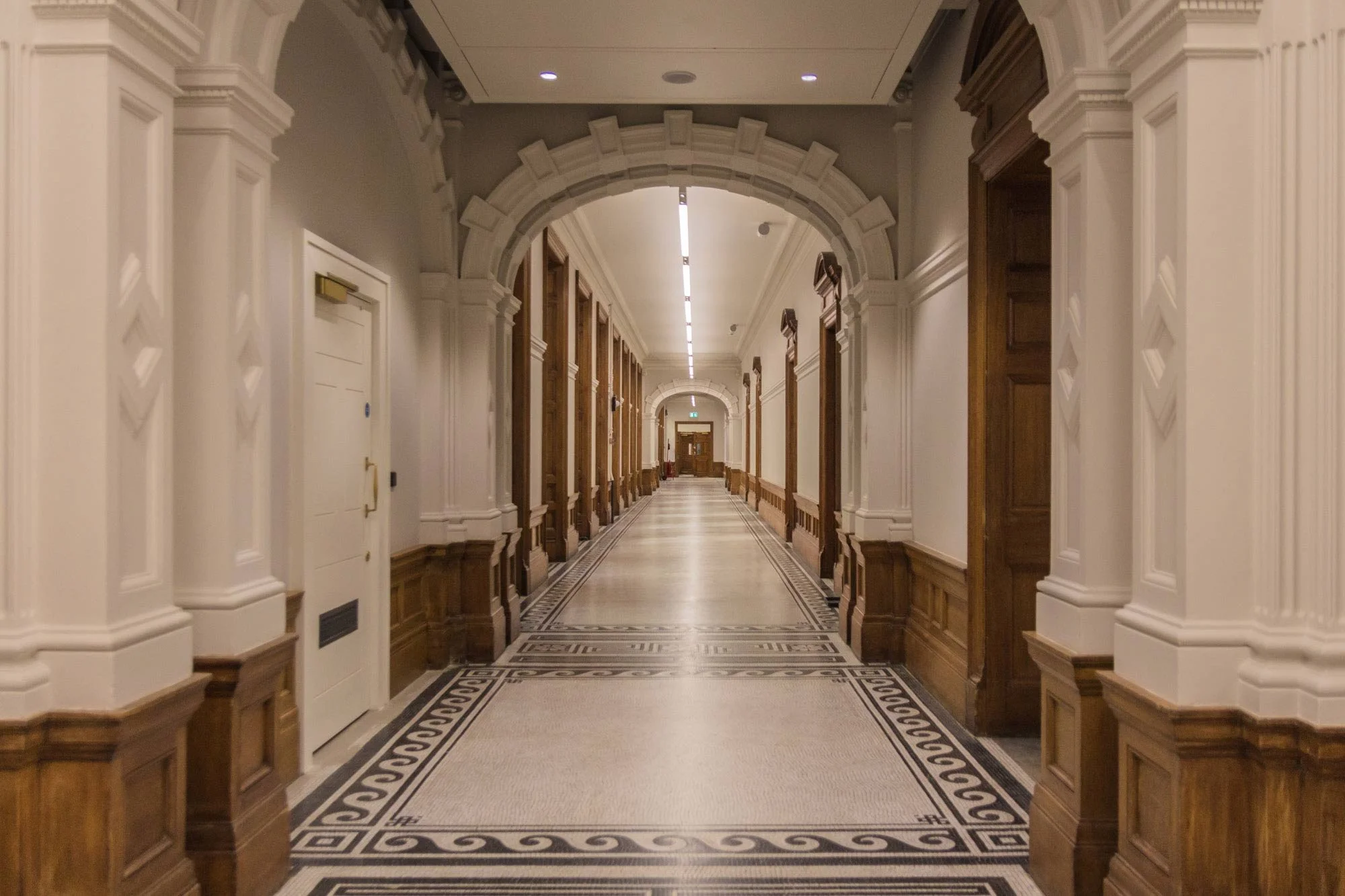 Historic interior within the Old Admiralty Building illustrating detailed refurbishment, heritage constraints and complex existing-building conditions.