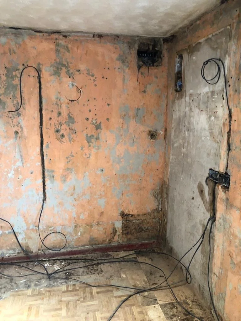 Existing kitchen being carefully removed and prepared for a new kitchen installation in Surrey.