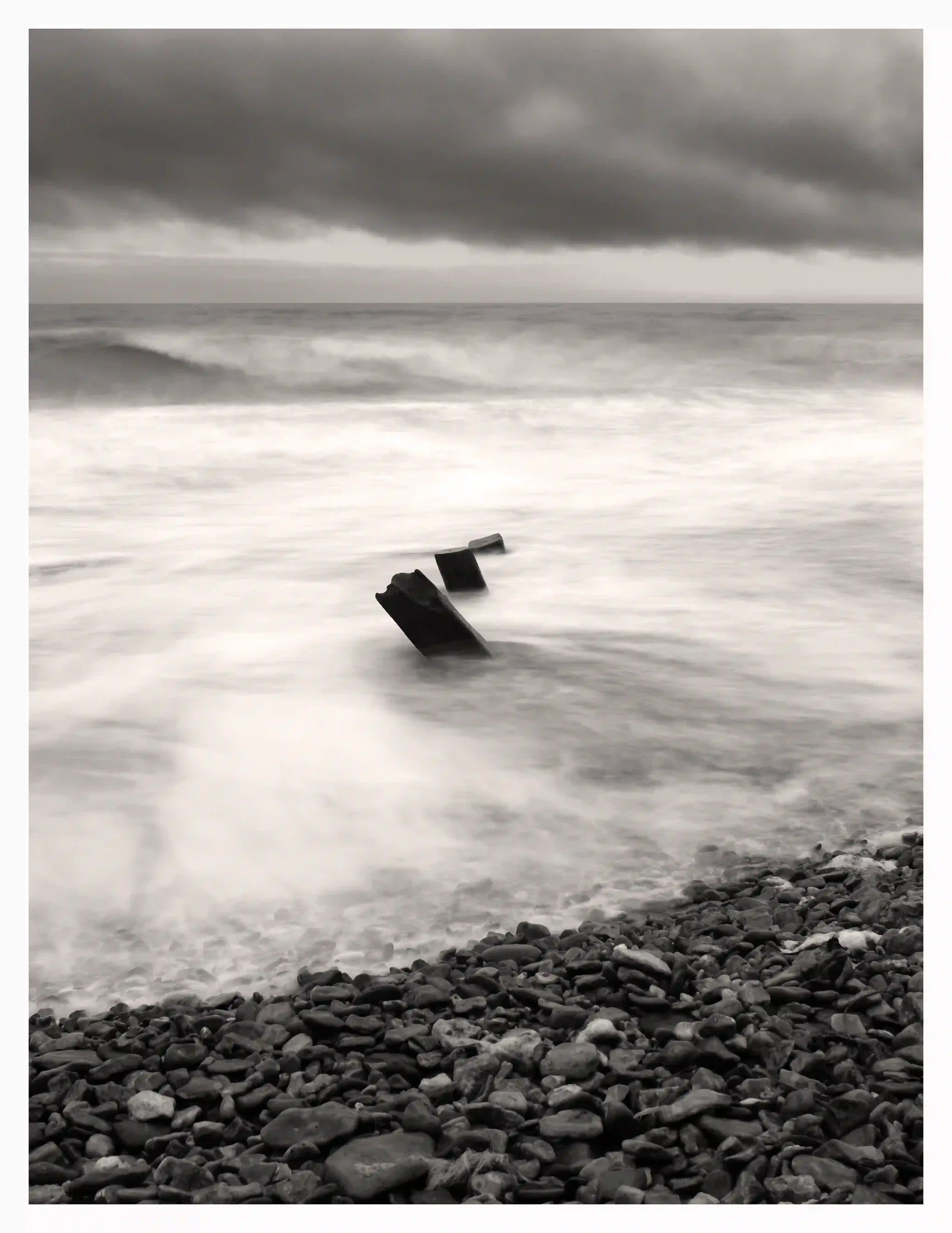 ENDURING
Under the stormy skies and against the waves of a rough sea; these wooden post remains appeared to stand bravely against the test of time and weather.
Brighstone, Isle of Wight, UK
