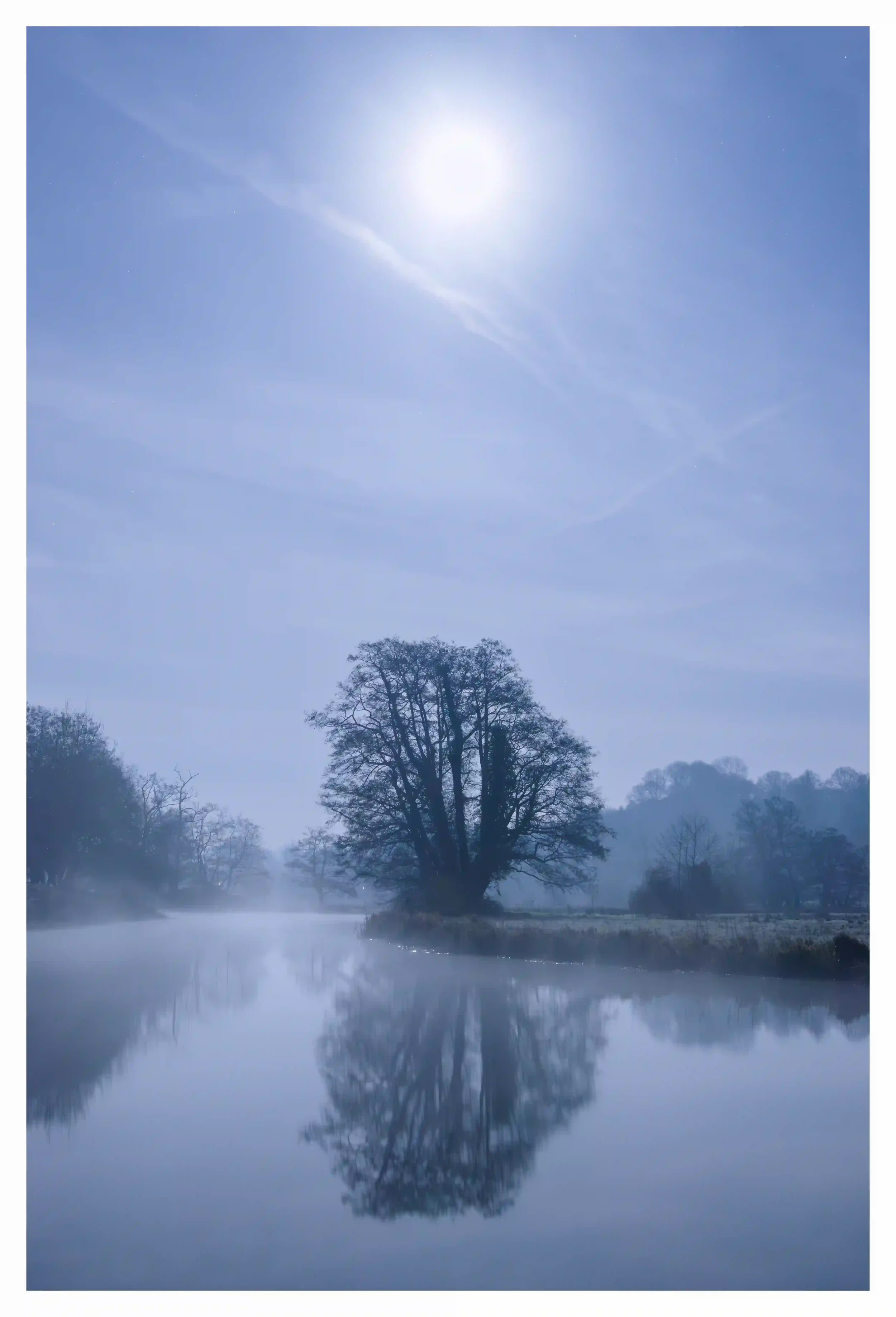 UNDER THE MOON LIGHT
River Wey, Godalming, Surrey, UK
A night of complete calmness along the River Wey. Temperatures freshly dropped as the soft luminance of moonlight made the landscape appear so delicately. The river calmly continued to flow by as 