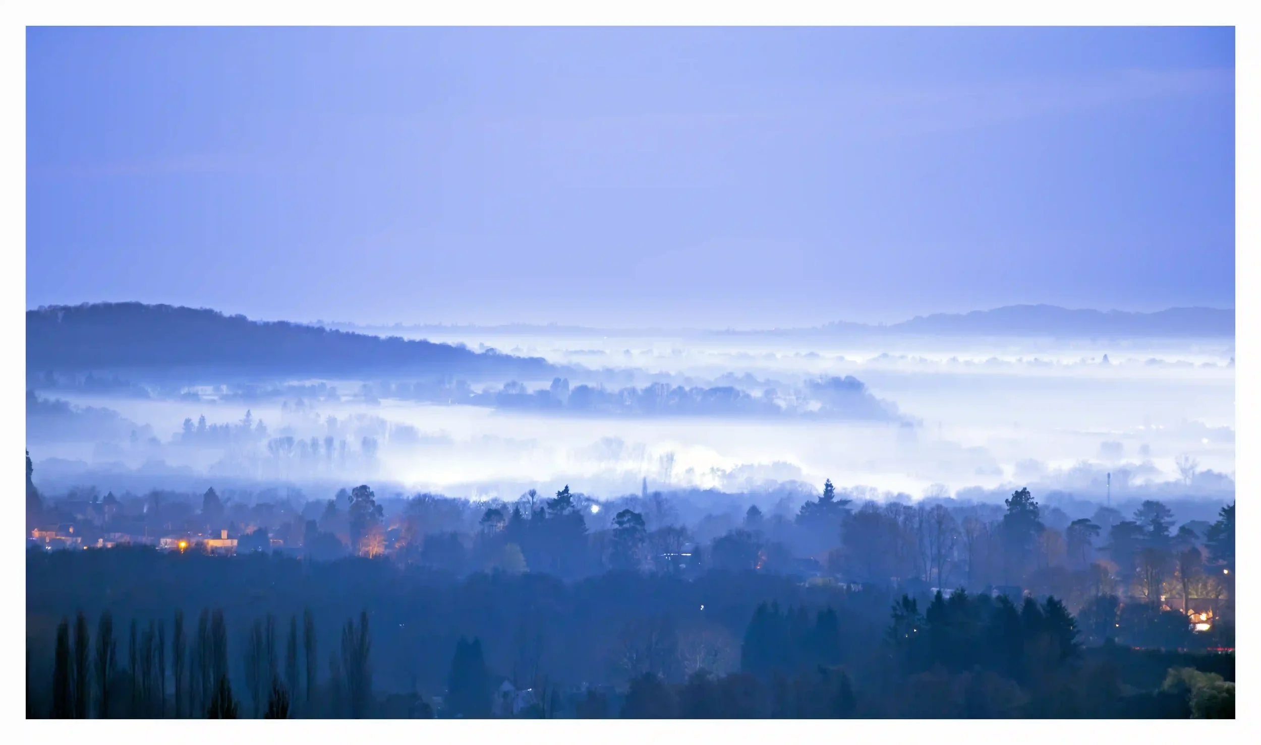 A BRUMOUS MARCH NIGHT
Chantry Woods, Guildford, Surrey, UK. 
As temperatures slowly dropped on this bright moonlit night it was on my journey home that I saw dense blankets of mist slowly form and drift through the valleys on the south side from the 