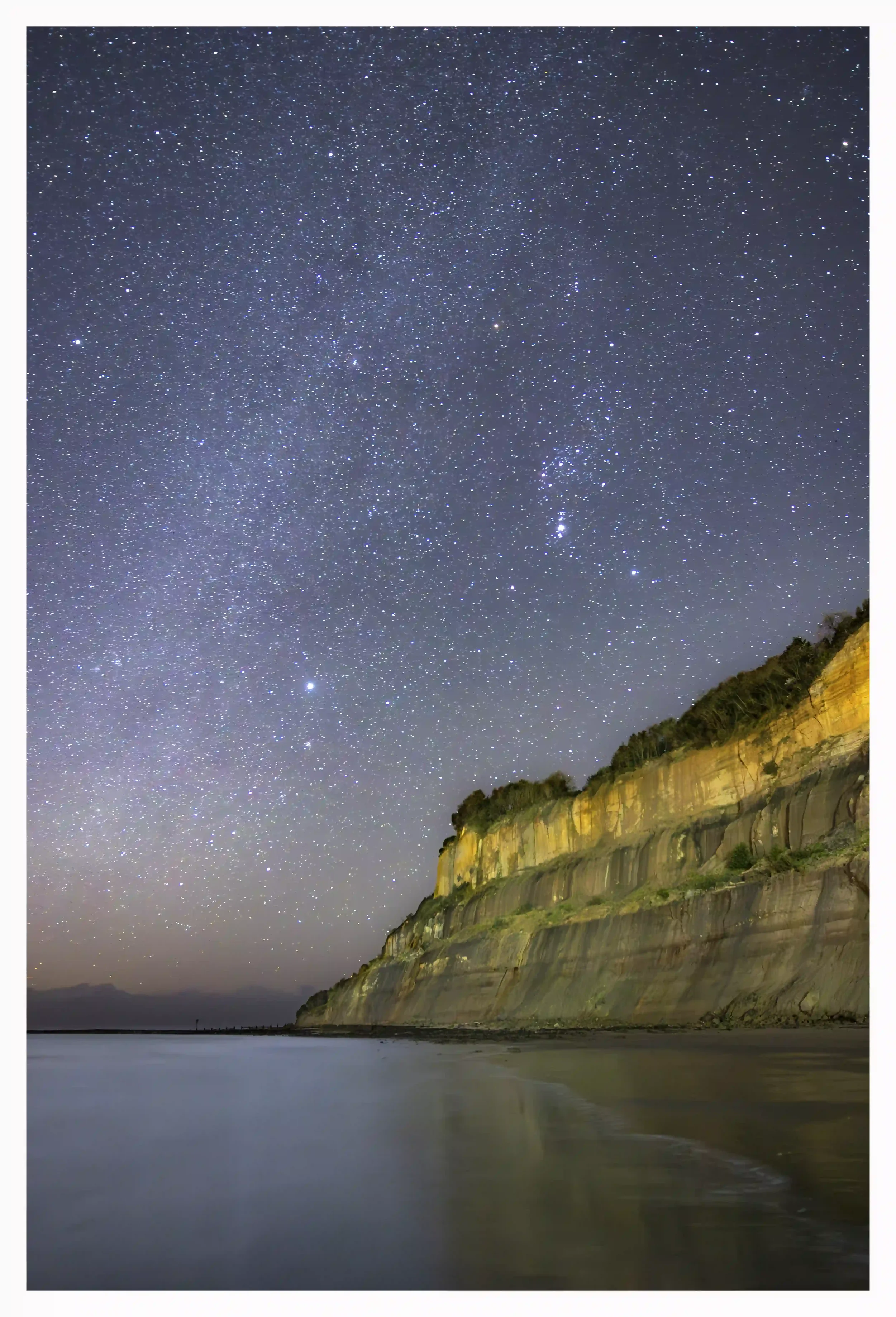 ORION OVER SHANKLIN CLIFF
The amazing tales of the great Orion constellation; a bold huntsman with great strength, and what better view could he have on this night over looking the cliffs with true character as the tide crept back in. 
Shanklin, Isle