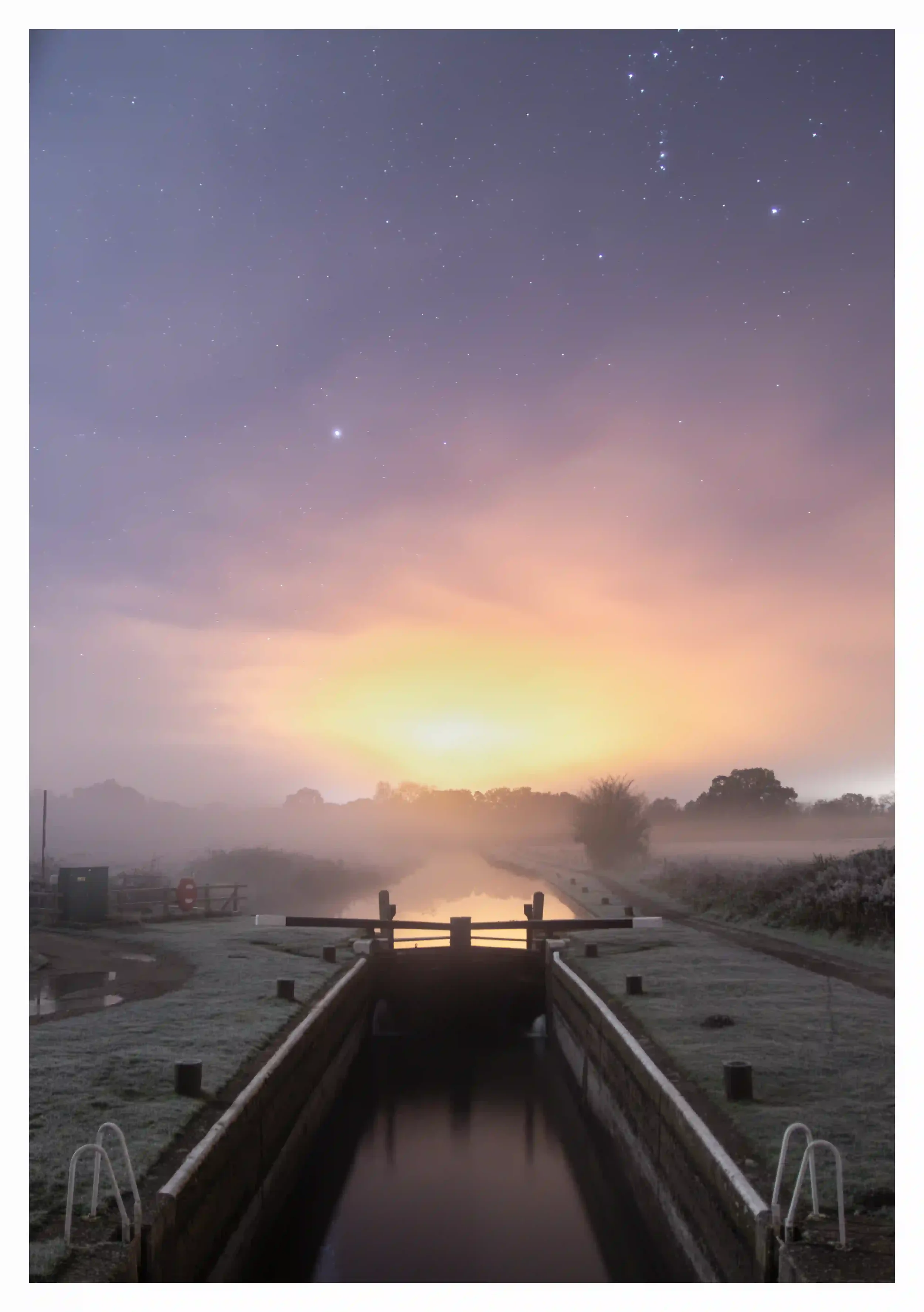 MYSTERIOUS
St Catherines Lock, Guildford, Surrey, UK.
A night when my imagination was softly stirred by the low passing mist blankets across the river; it may have been cold in temperature yet somehow the absorbed industrial lighting seemed so warmin