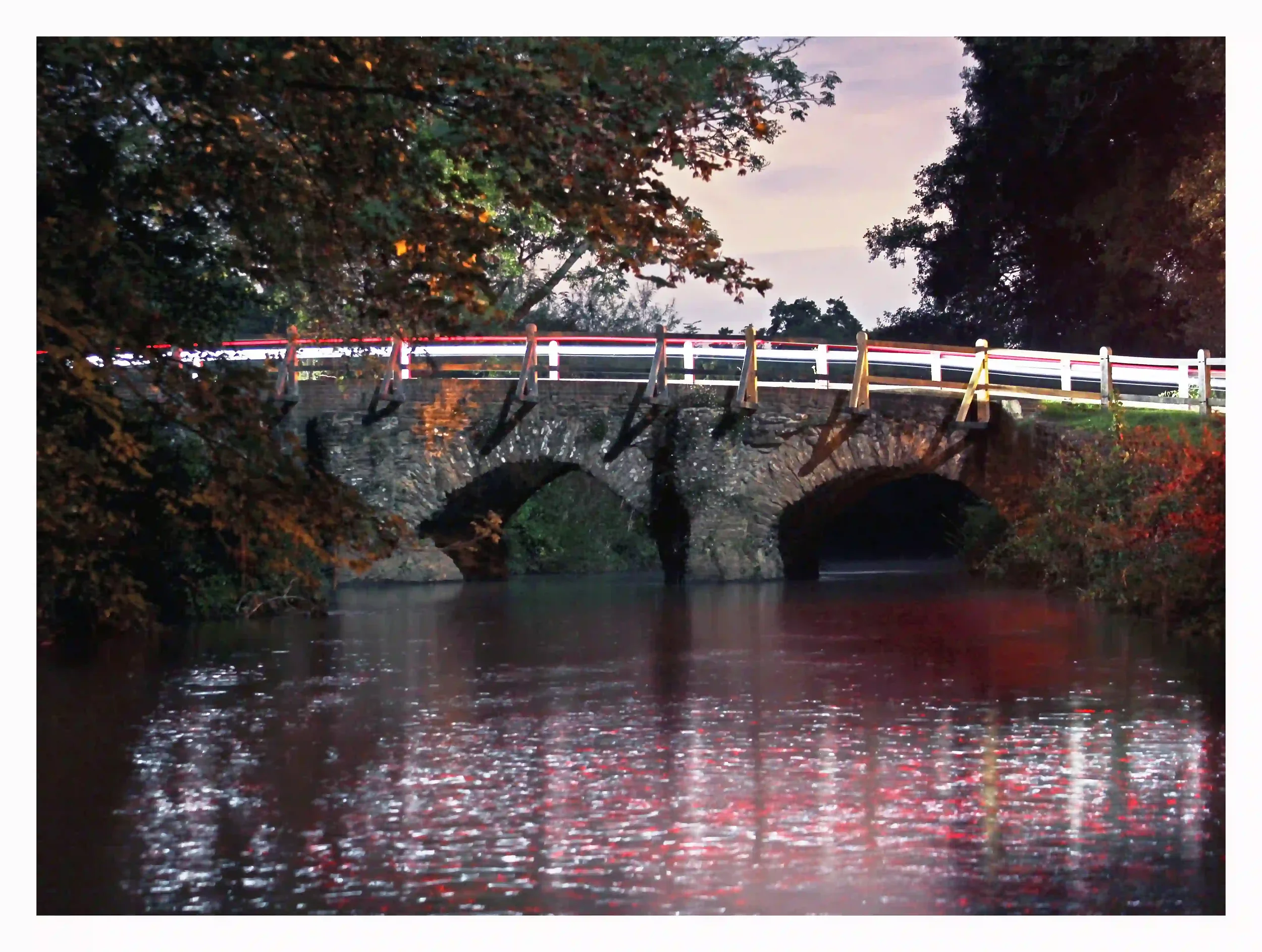 ENCHANTED EASHING BRIDGE
Eashing Bridge, Godalming, Surrey, UK.
A stunning medieval bridge with such amazing character and undoubtedly; a few stories to tell from the past.  As the reflections from the light trails twinkled in the river on this night