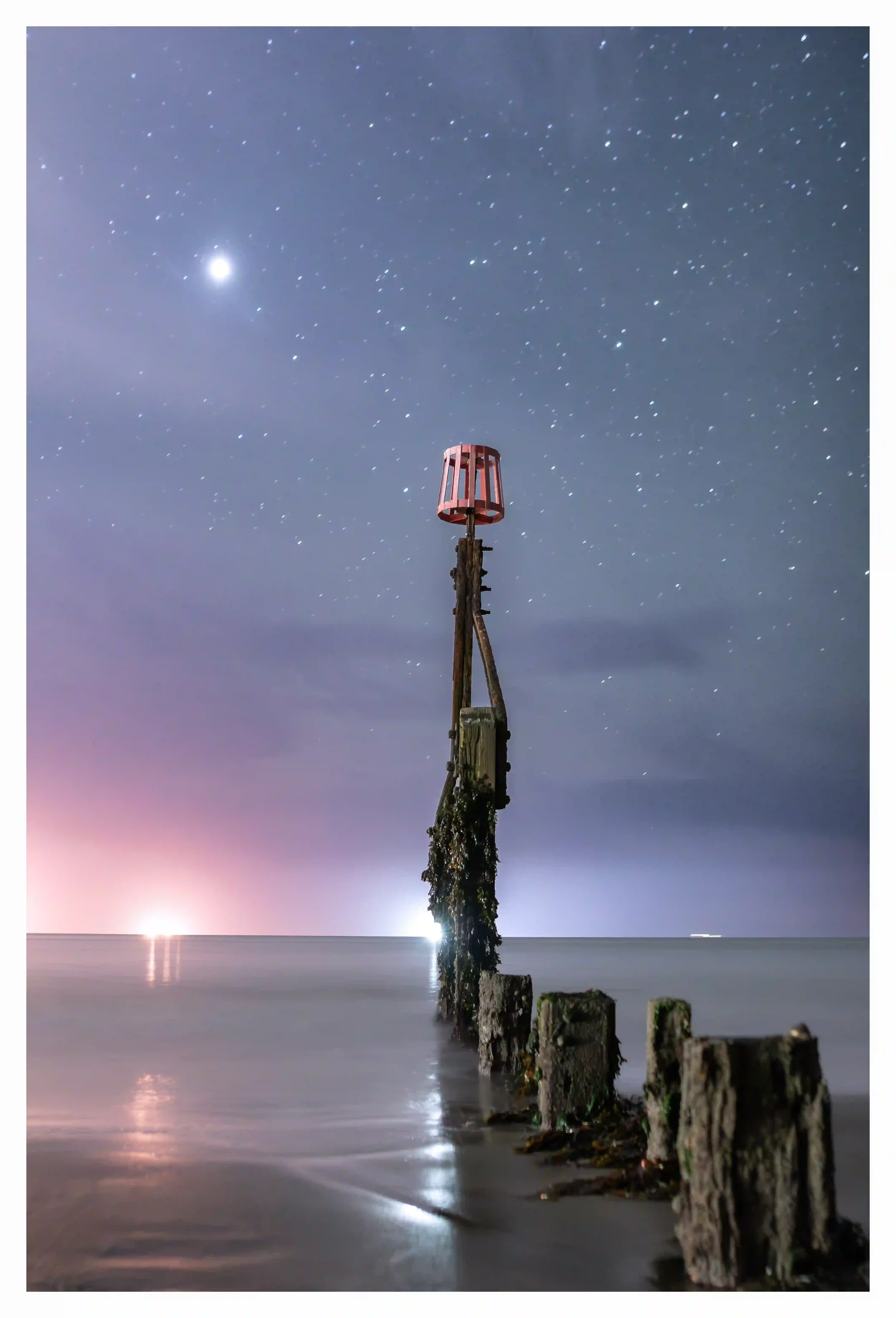 STAND ALONE PROUDLY
There will always be times when something can only be truly done alone, a goal to achieve, task to tackle, a storm to see through or a glimmer of light to reach for. As this weathered tide breaker appeared to be reaching for the s