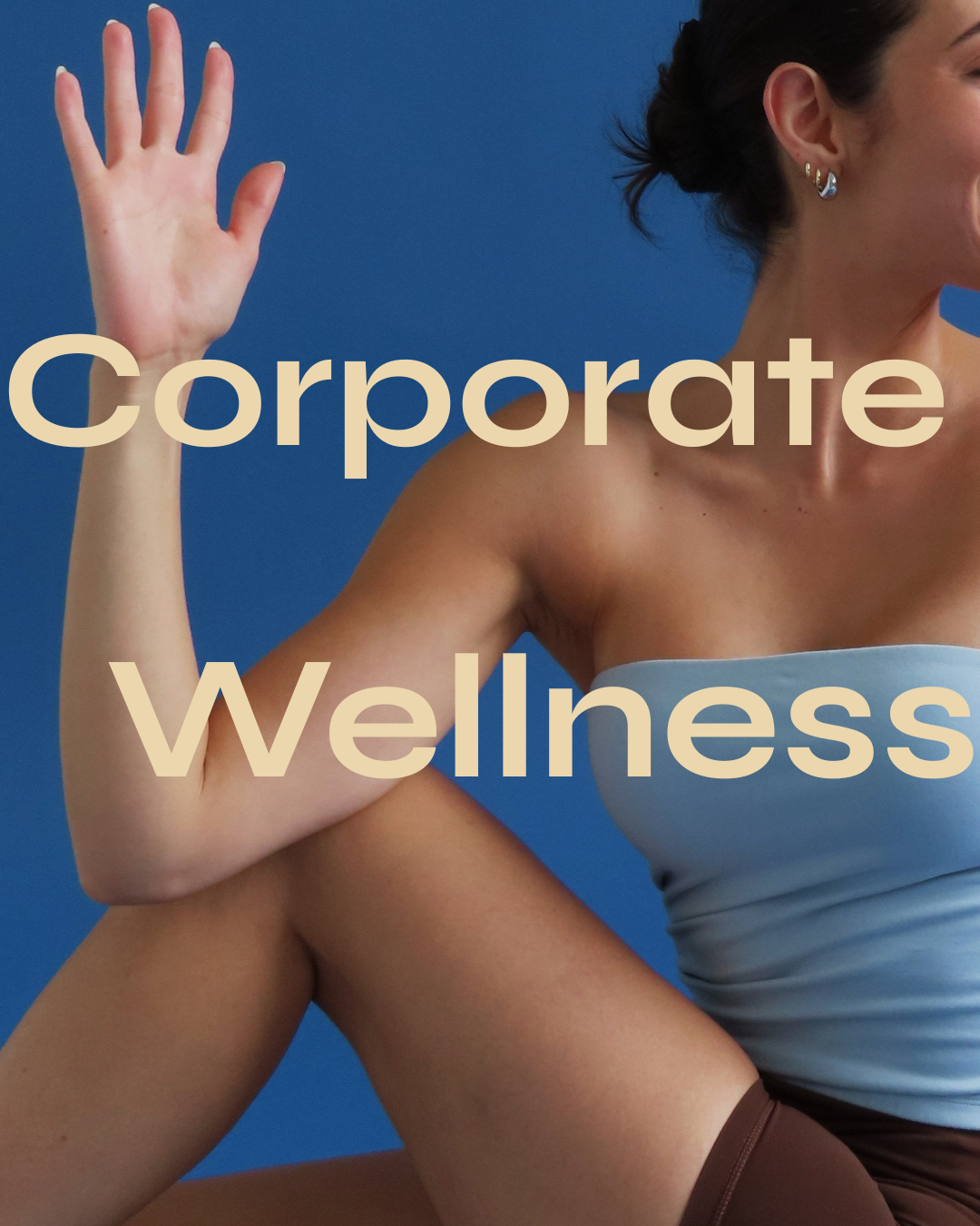A woman in athletic attire doing a yoga pose against a blue background, with the words "Corporate Wellness" overlaid.