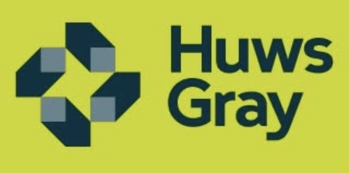 Huws Gray logo with a geometric star-shaped symbol and blue text on a yellow background.