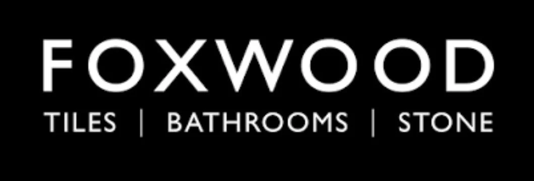 Black background with white text reading "Foxwood Tiles Bathrooms Stone".