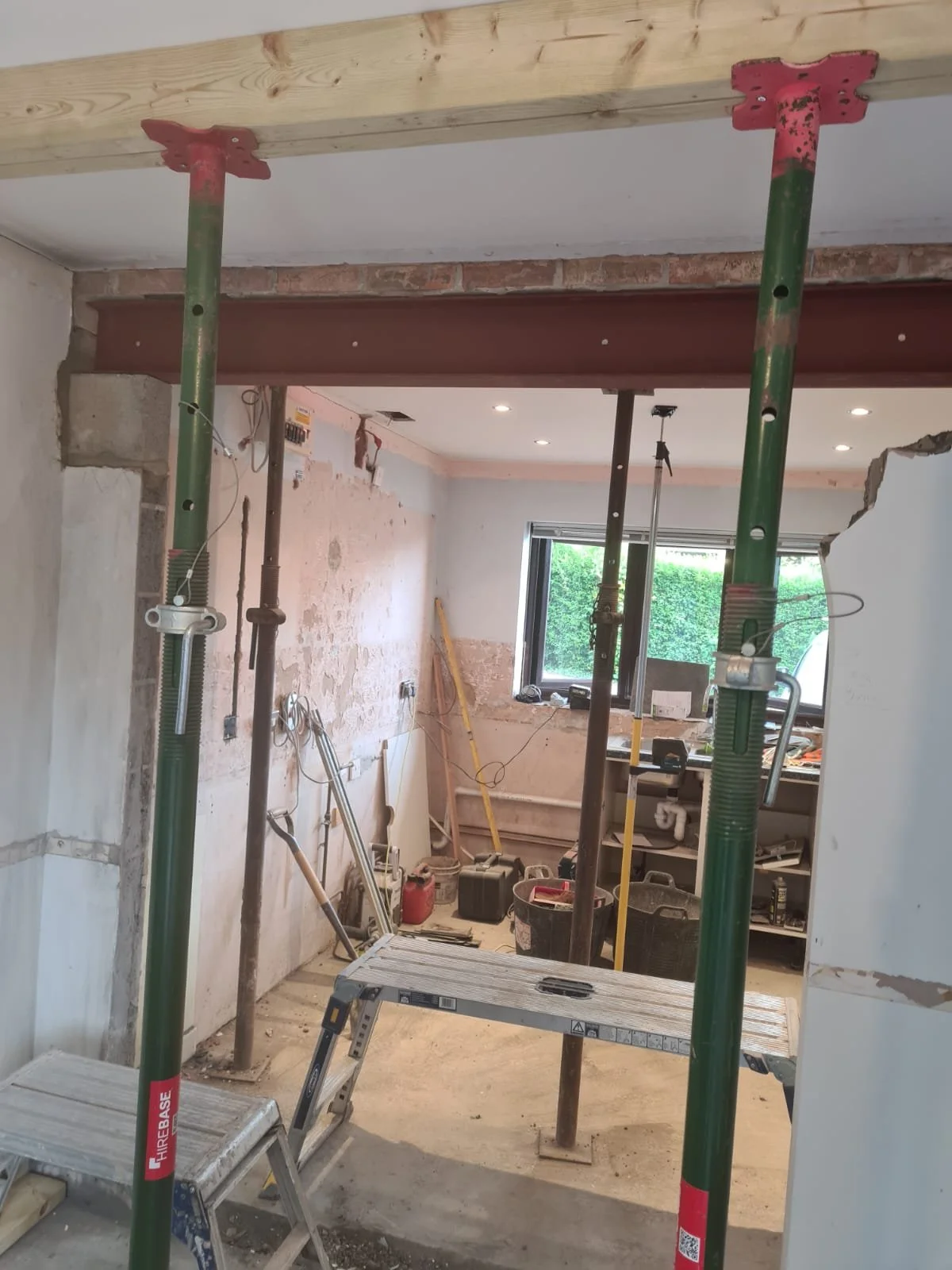 fitting a RSJ, building services