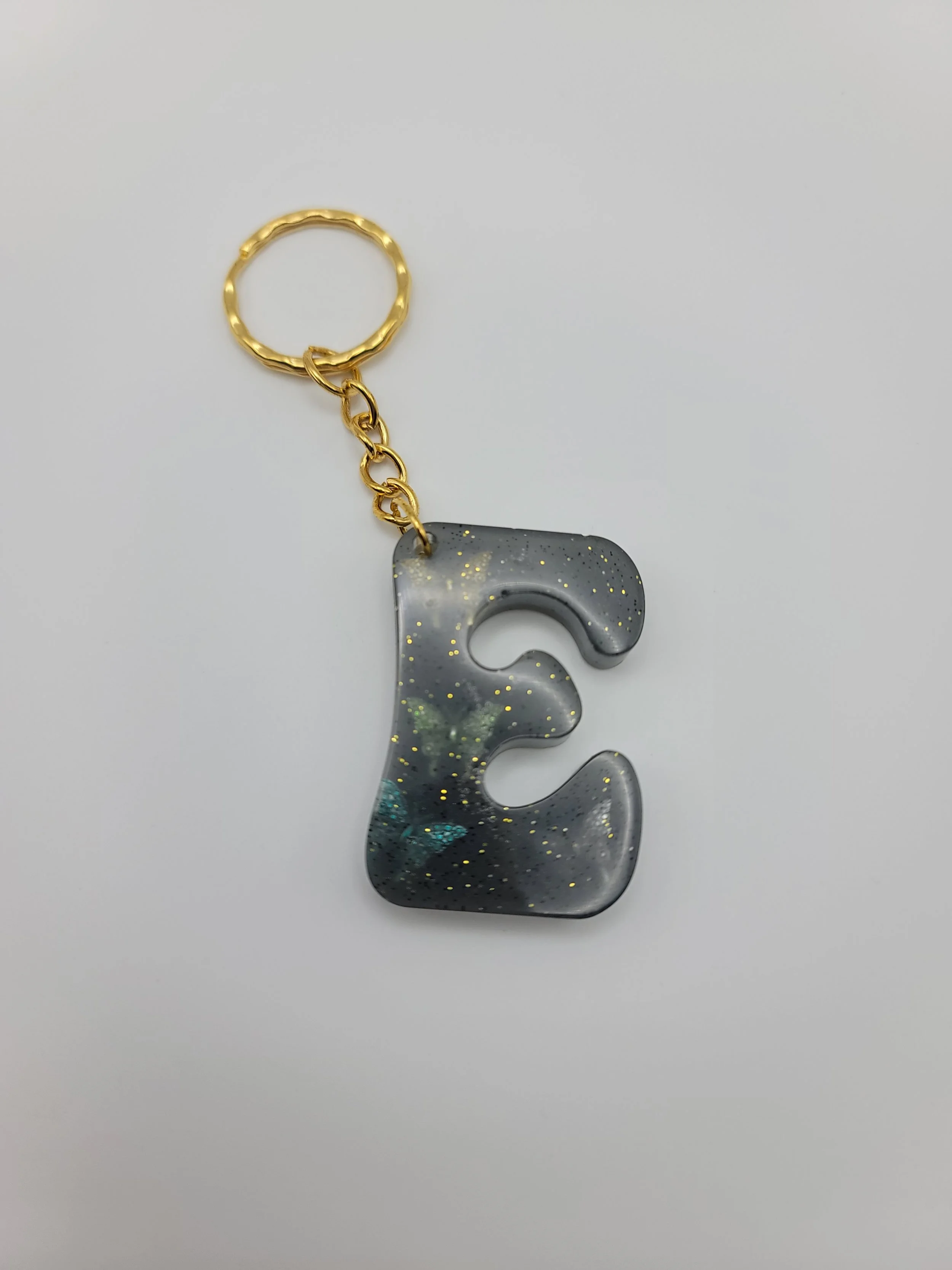 "E" Grey Flower Glitter Keychain