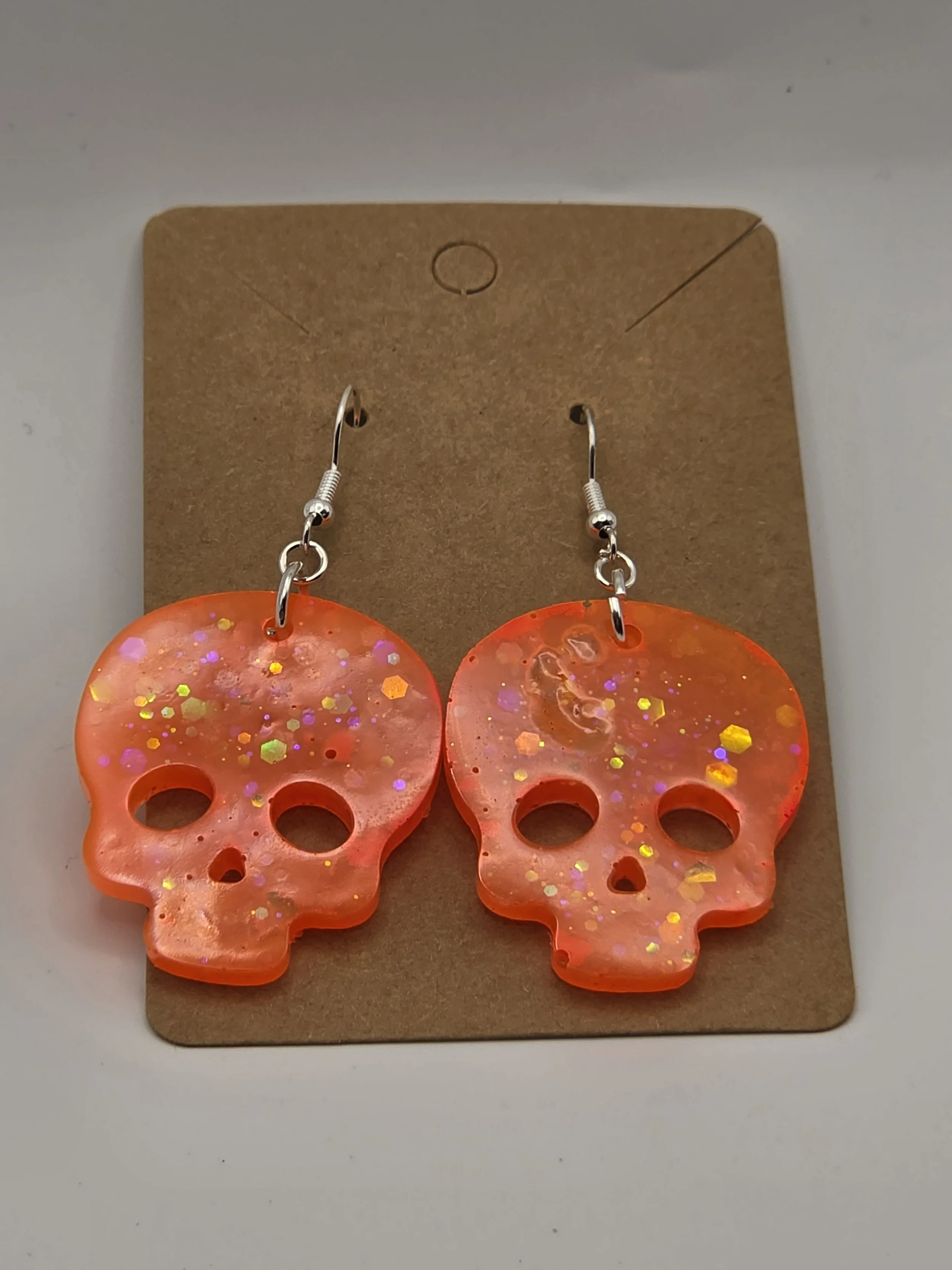 Orange Glitter Skull Earrings