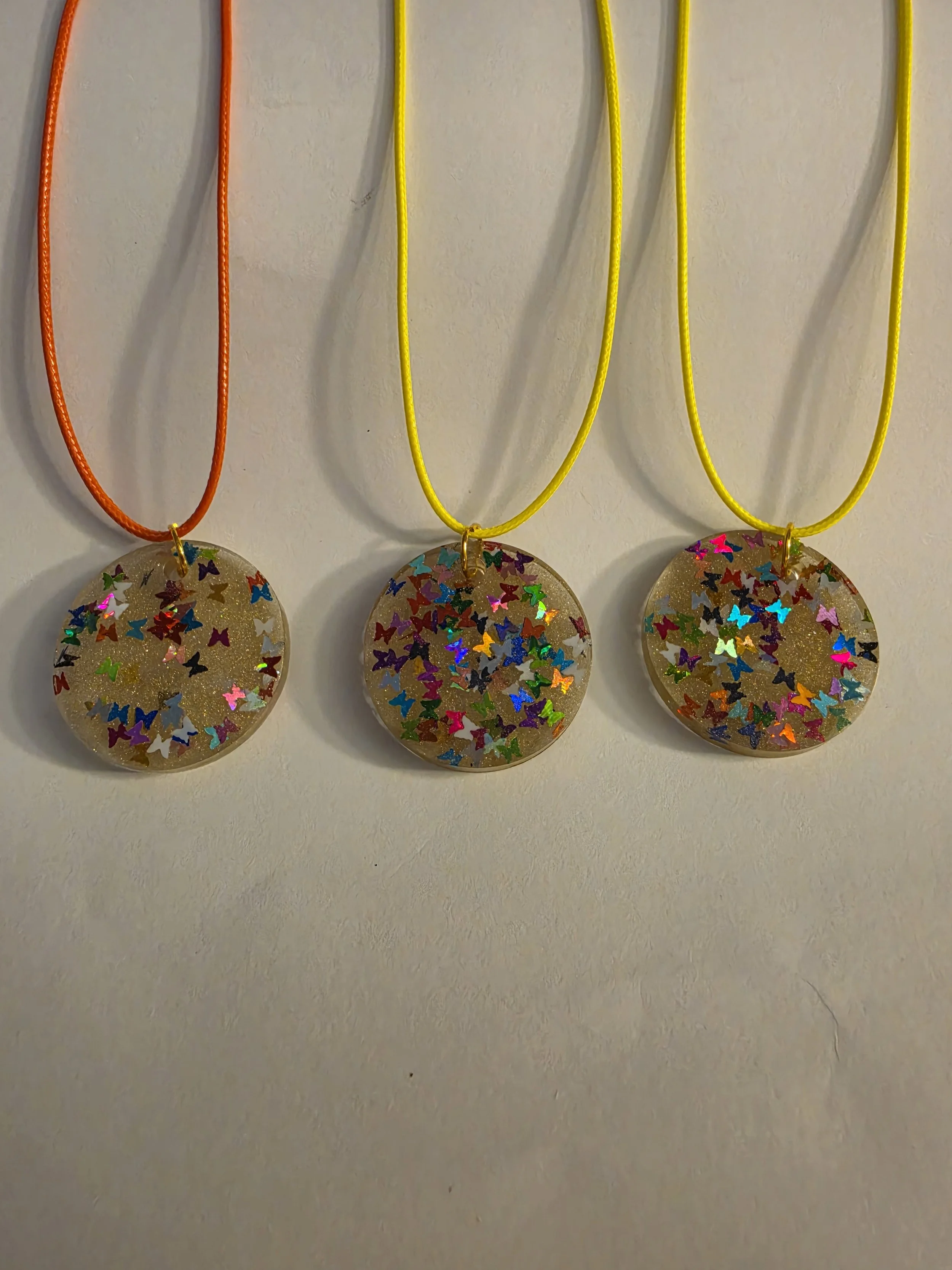 Gold With Glitter Butterflies Round Necklace