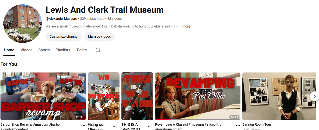 YouTube channel page for Lewis and Clark Trail Museum with a banner and video thumbnails.