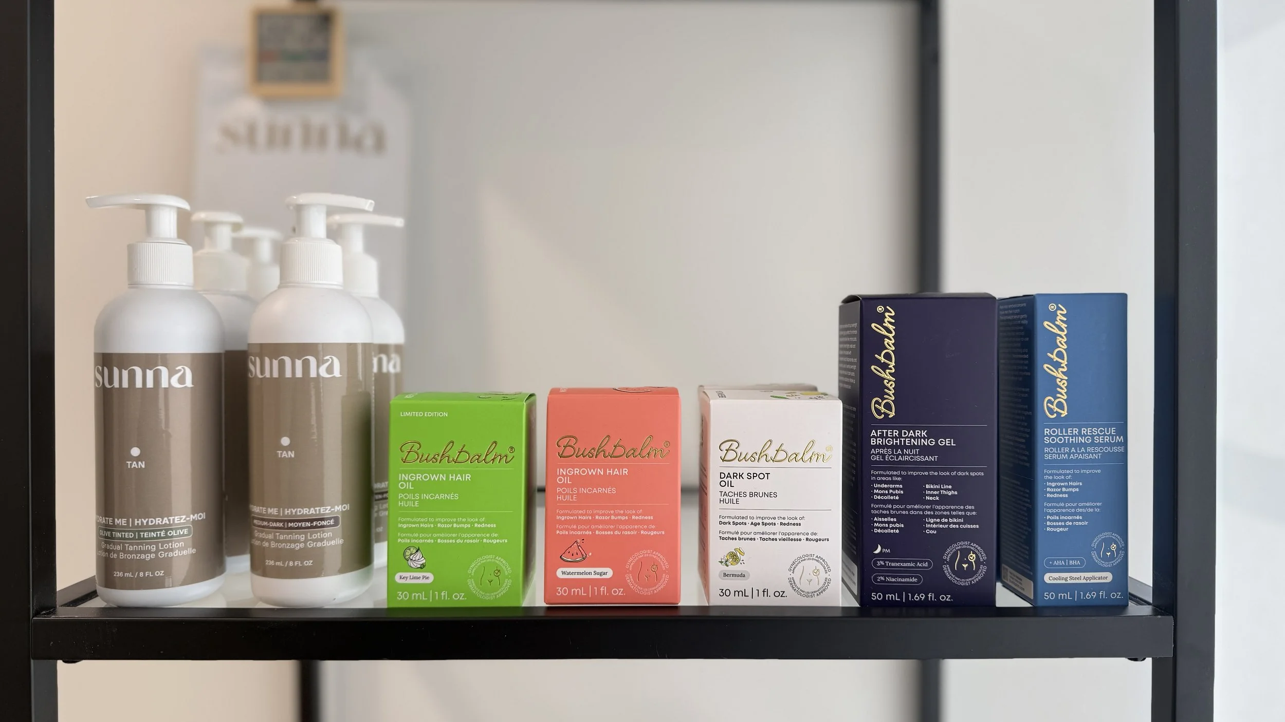 Professional Bushbalm and SunnaTan skincare and aftercare products used at Wyld Sol in Calgary to support healthy skin, body sugaring aftercare, and long-lasting custom spray tan results.