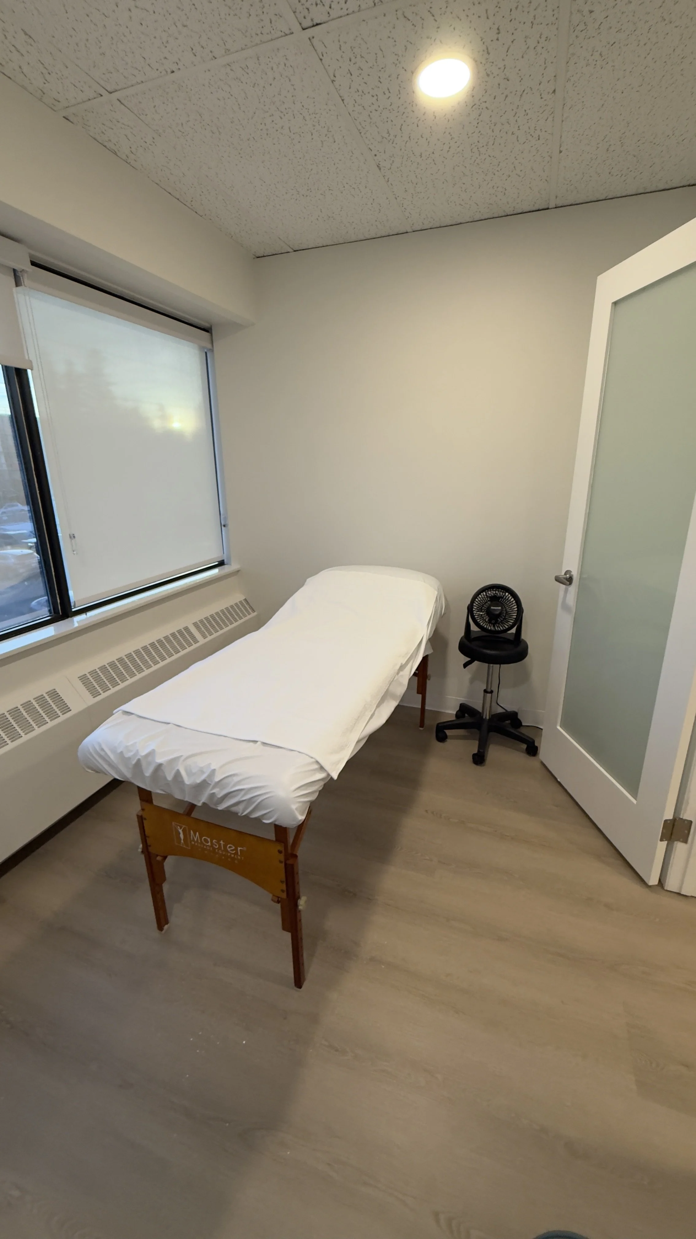 Private treatment room at Wyld Sol Body Sugaring & Spray Tanning in Calgary, where personalized body sugaring and custom spray tanning appointments are tailored to every client.