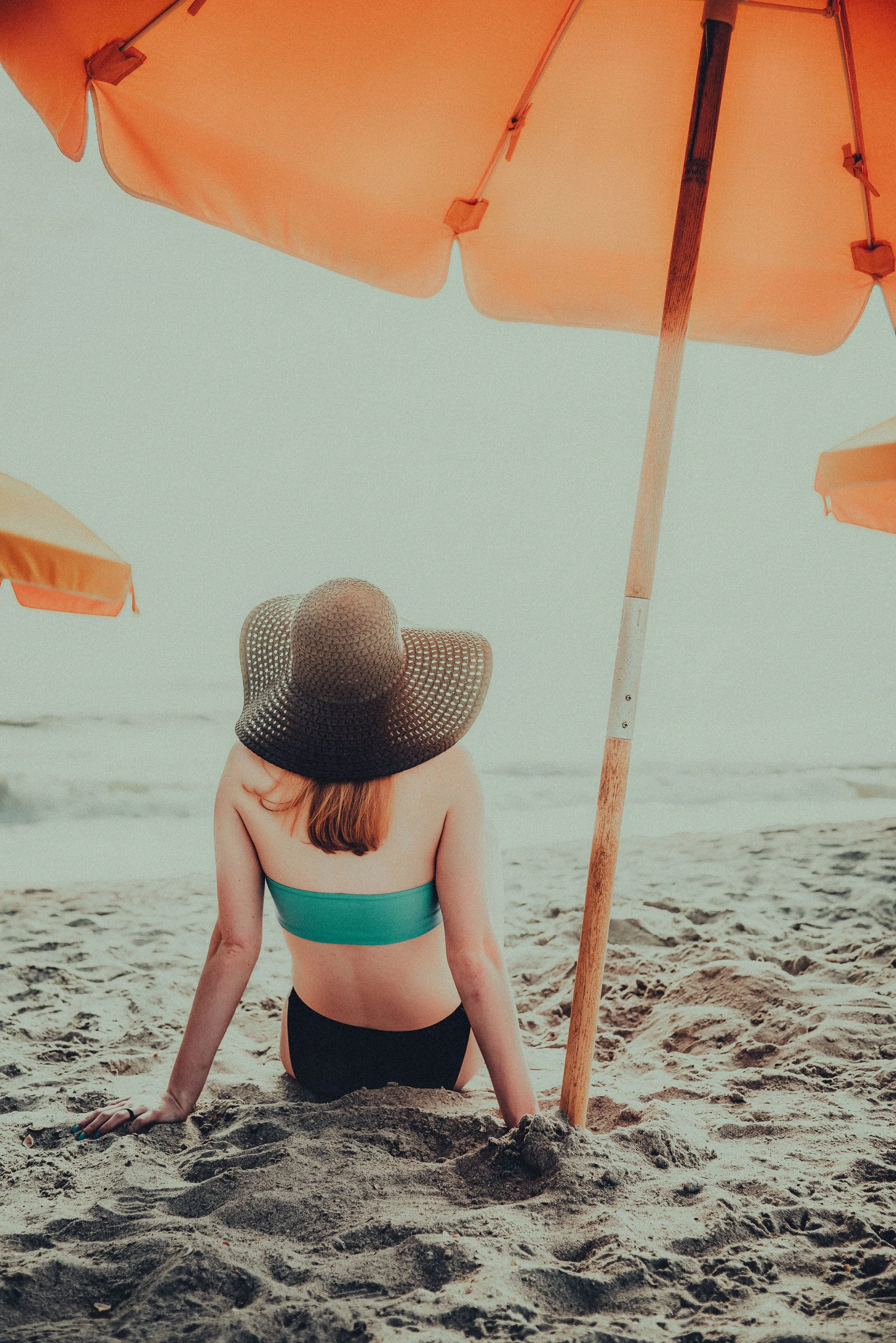 Vacation-ready skin achieved with professional body sugaring and custom spray tanning at Wyld Sol Calgary.