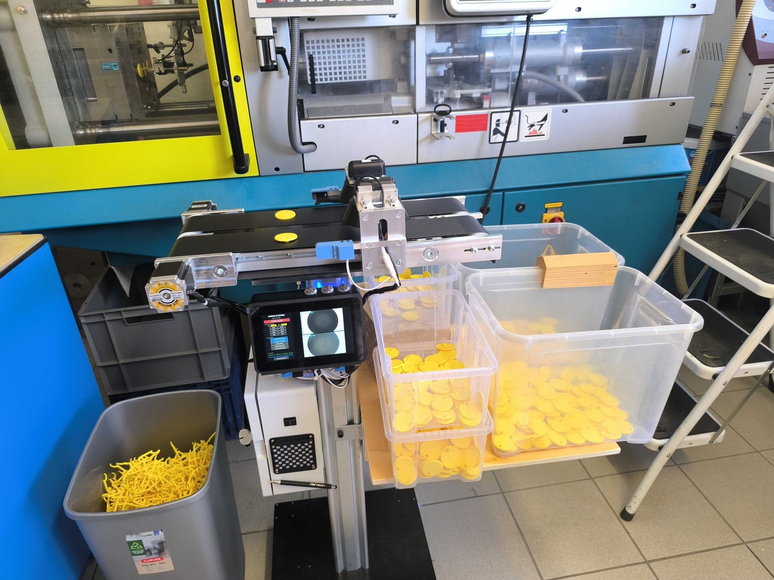Visual check system for injection molded parts.
