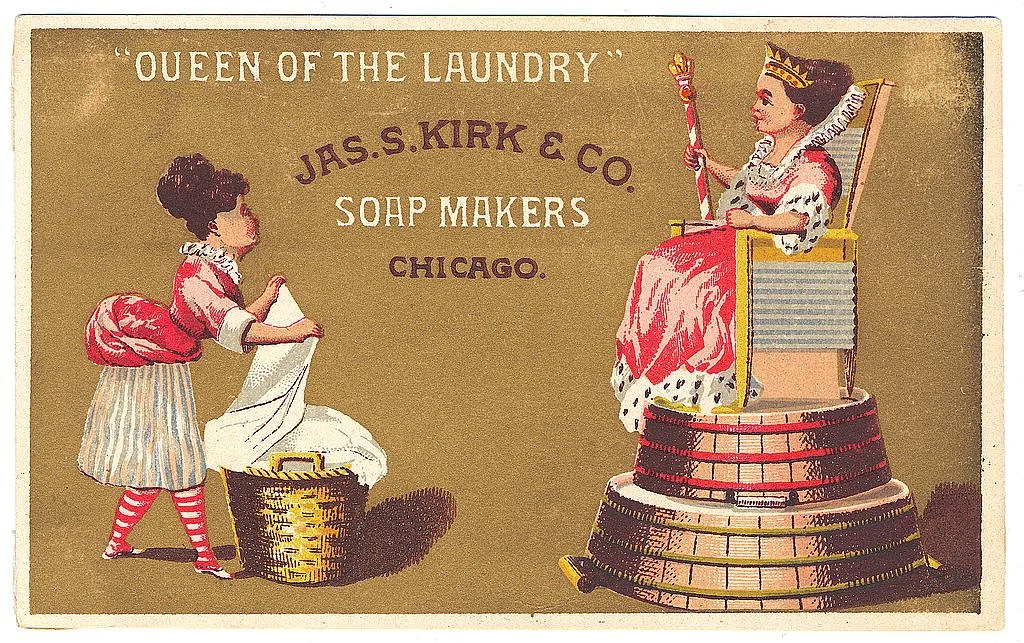 1880 chromolithograph trade card titled "Queen of the Laundry," Jas. S. Kirk & Co. Soap Makers, Chicago, showing a laundress with a basket of wash standing before a crowned queen seated on a throne made of wash tubs and washboards.