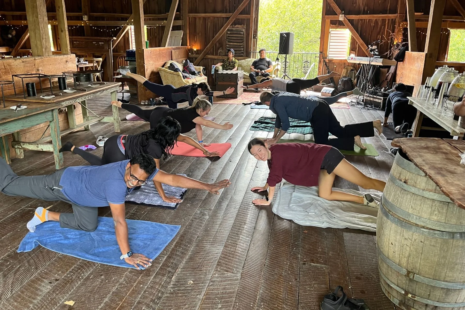 Team retreat at Rocklands Farm Winery where the team is enjoying a yoga session in the barn