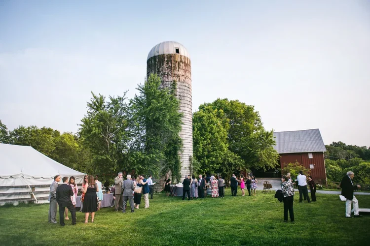 Corporate event gathering outside the barn at Rocklands Farm Winery in Maryland