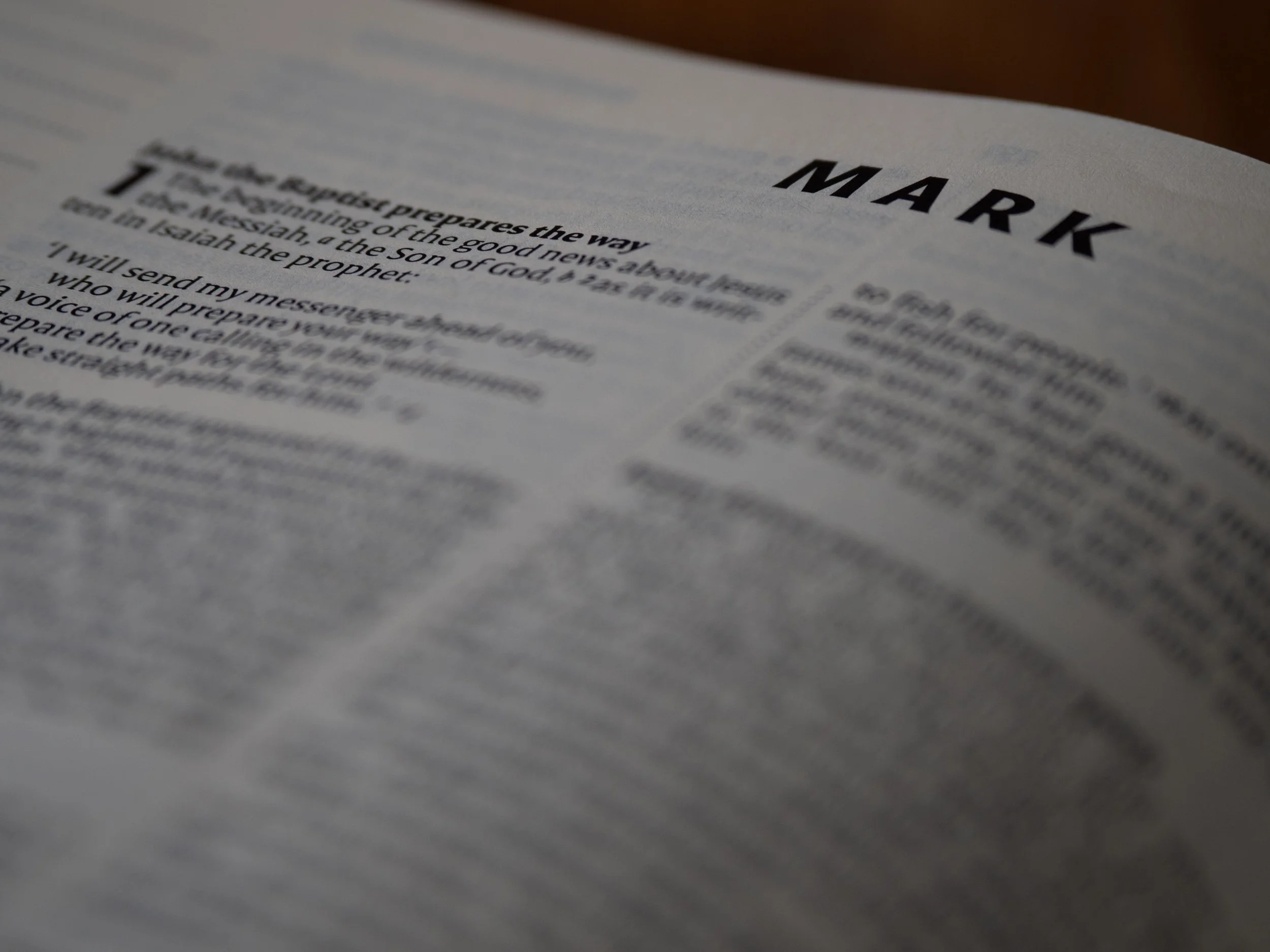 Close-up of a page in a book or magazine with a headline that reads 'MARC' and the beginning of an article discussing the message of a prophet and the good news about Jesus Christ.
