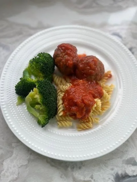 Italian lentil meatball meal with chickpea pasta, marinara and broccoli