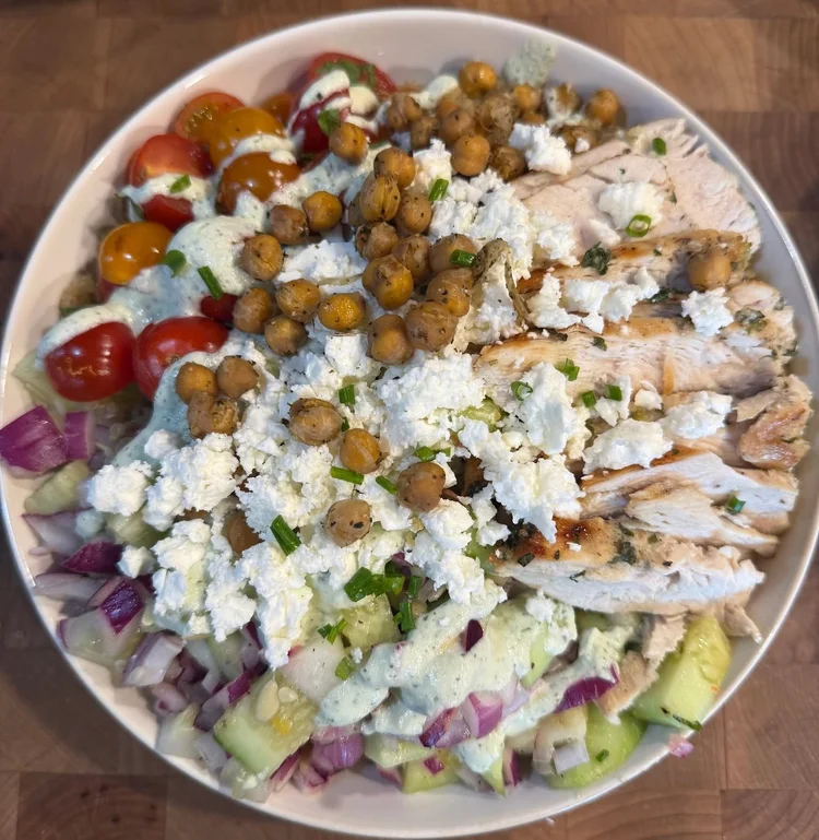 Greek Street Power Bowl with chicken, quinoa, vegetables, feta and chickpeas