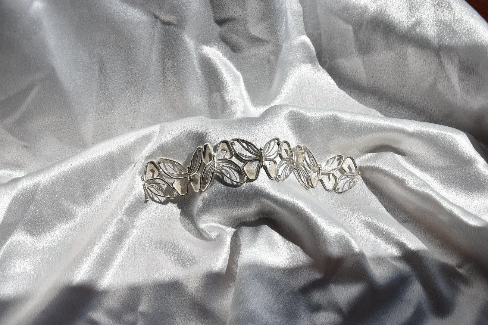 Vlinderarmband bewegend ellement "eindstuk jaar 2"