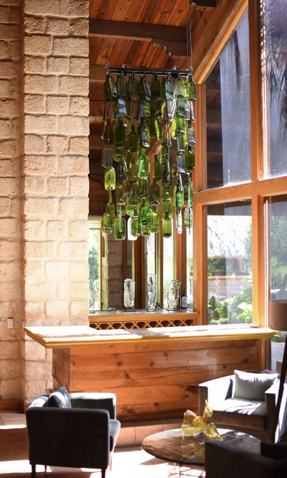 Pandemic Bottles — upcycling glass, hanging sculpture, fused glass wine bottle installation, glass art, architectural interior design, botellas de cristal fusionado, cristal de botella, arte en cristal fusionado Mexico