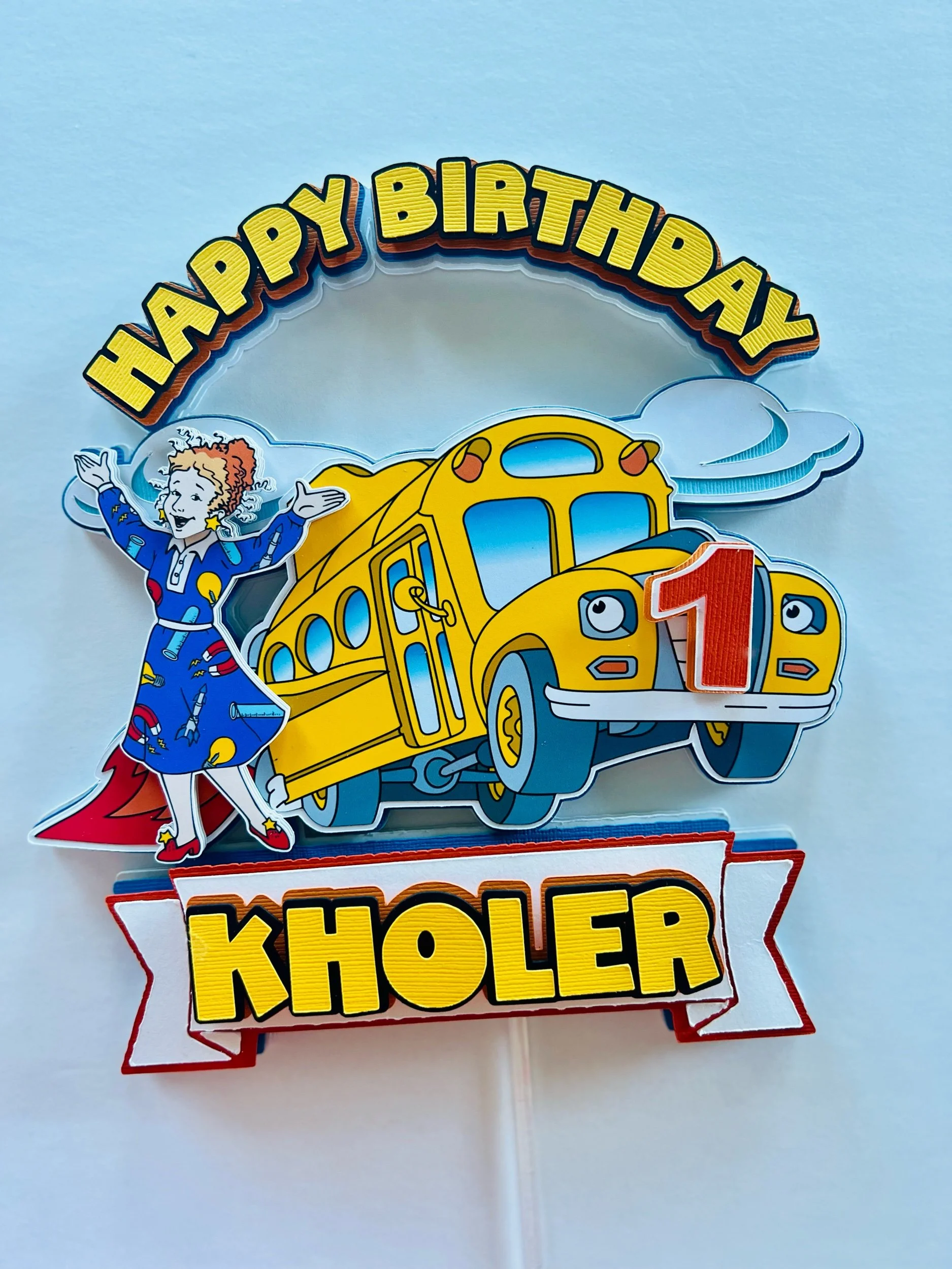 the magic school bus cake topper