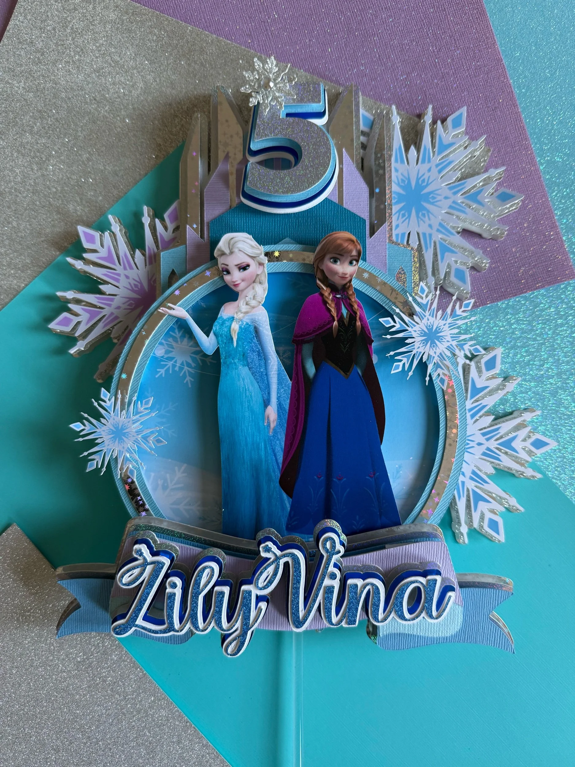 Frozen cake topper