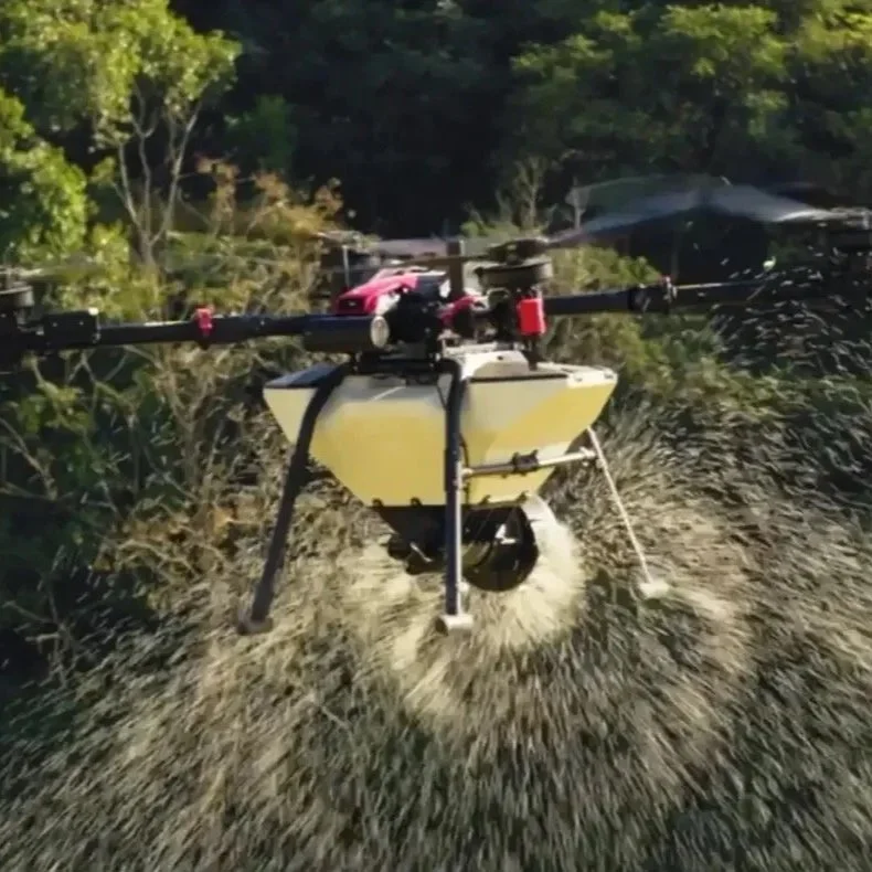 A drone spraying liquid over a field of crops.