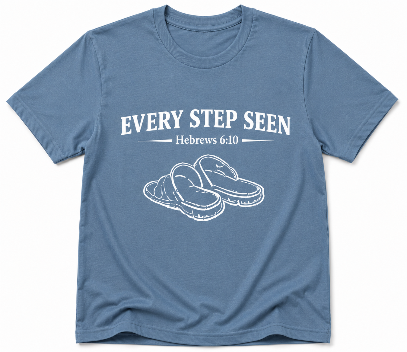 Dusty Blue Christian T-shirt featuring the “Every Step Seen” design, reminding believers that God sees, knows, and walks with them through every step of life.