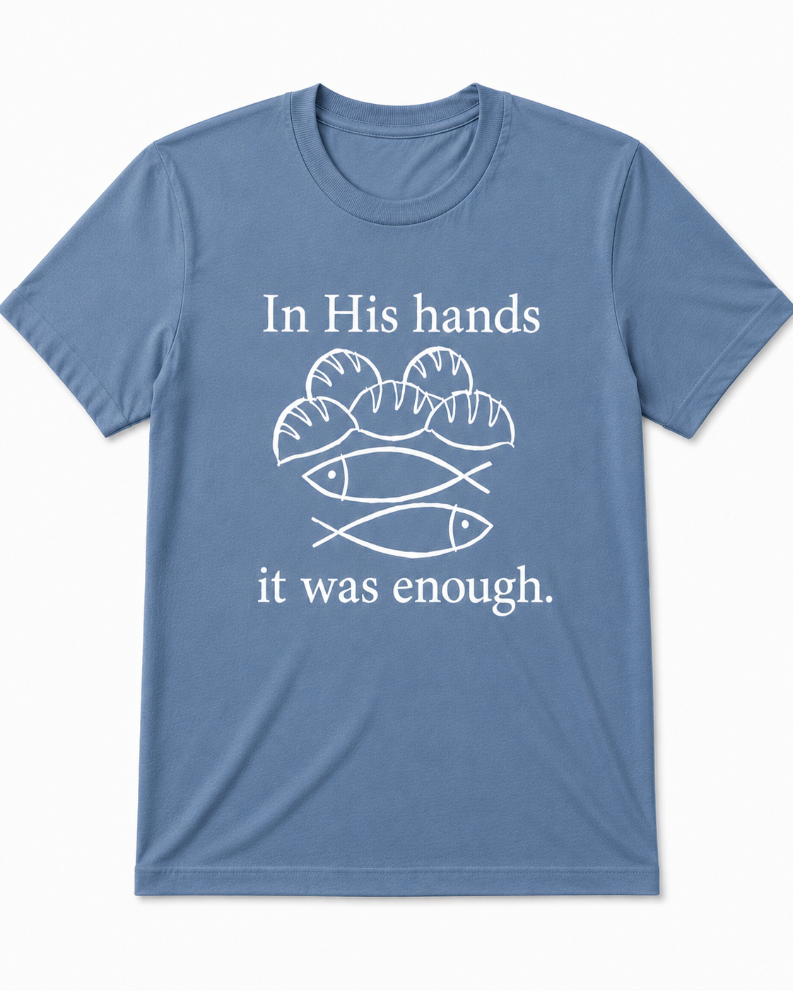 Dusty Blue Christian T-shirt featuring the "Fishes & Loaves" design inspired by Matthew 14:13–21, reminding believers that Jesus can multiply even the smallest offering for His glory.
