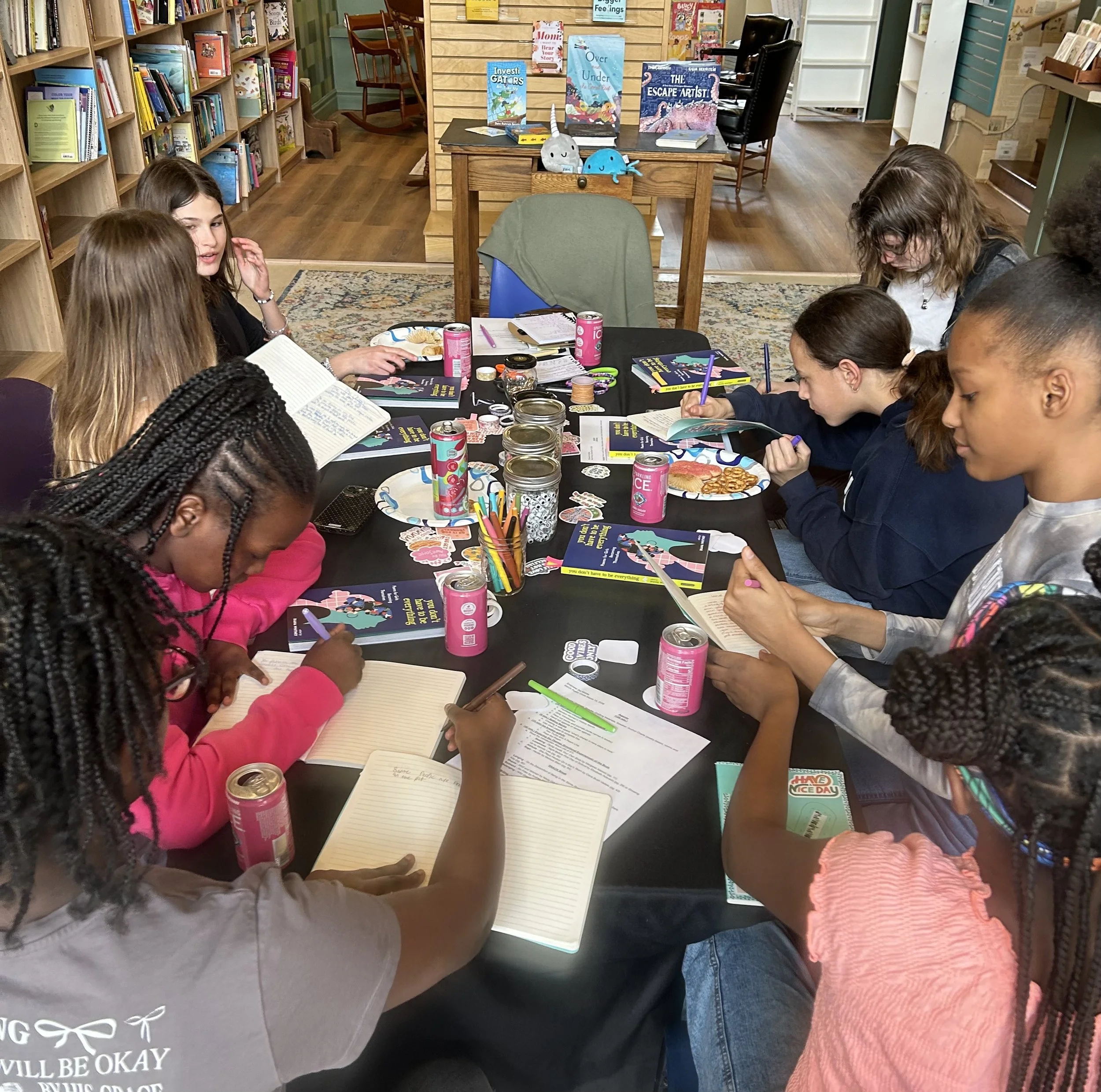 Writing original poetry after being inspired by reading poems from You Don't Have to be Everything in March's Girls' Empowerment Poetry Circle. 