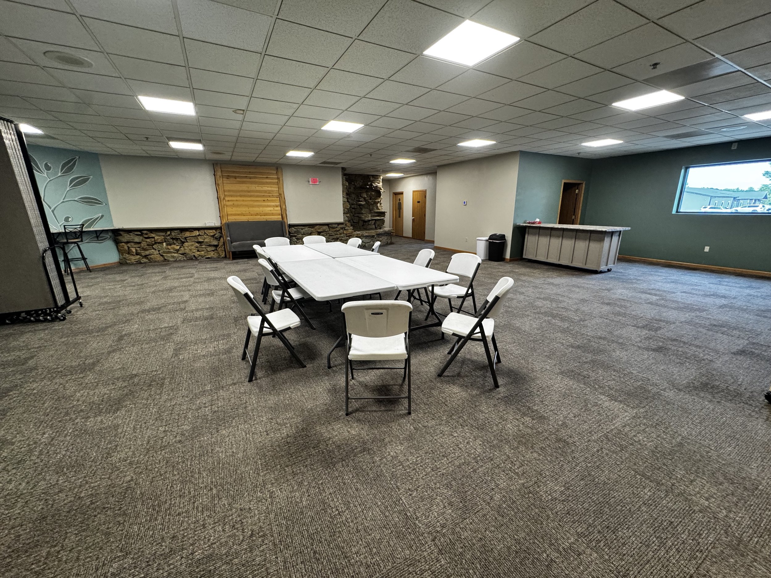 An indoor meeting space can be arranged with various table/chair set ups to meet your groups needs.  The room features a small kitchenette for light refreshments for your meeting or celebration.