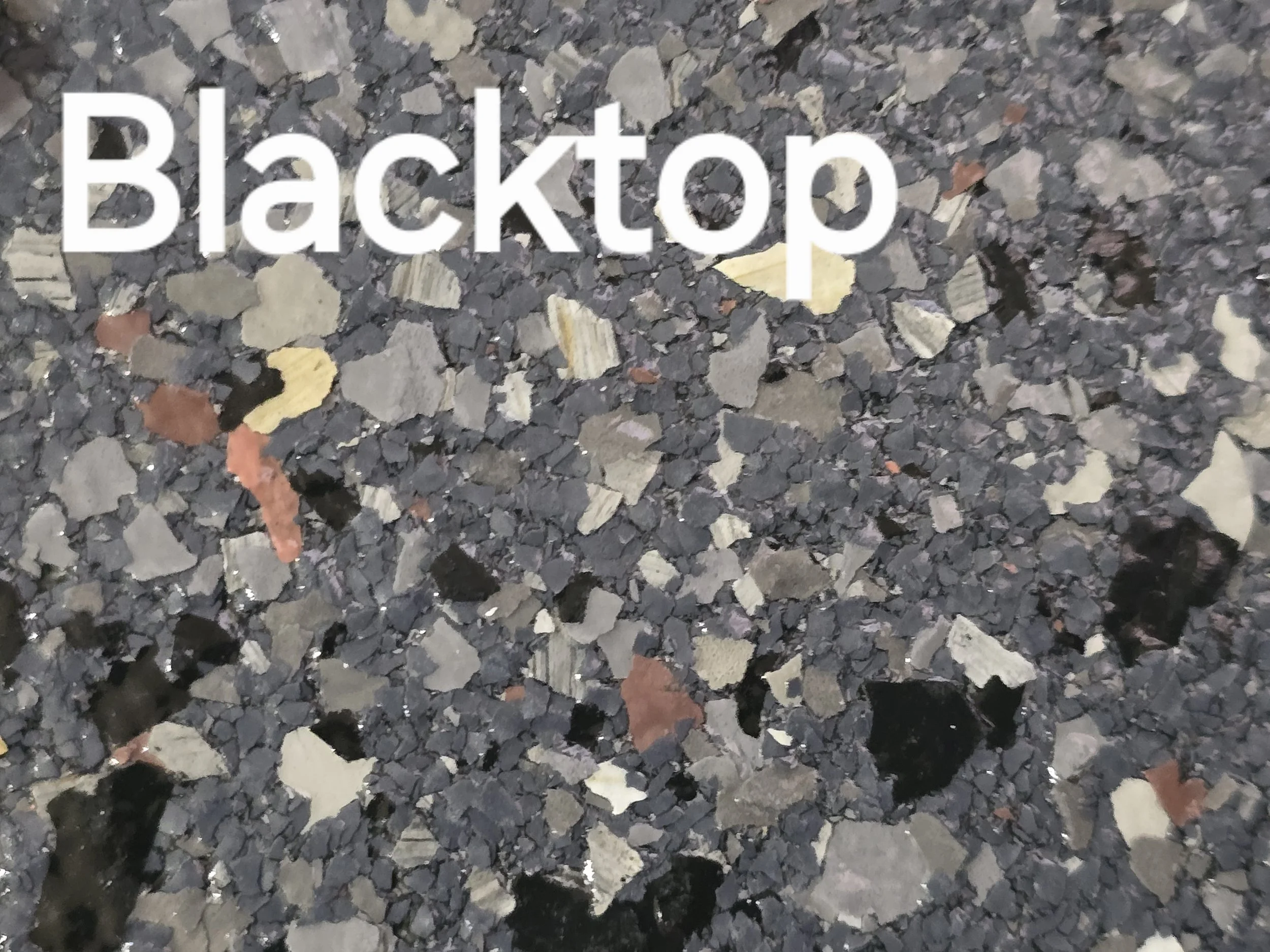 Blacktop colored vinyl flakes