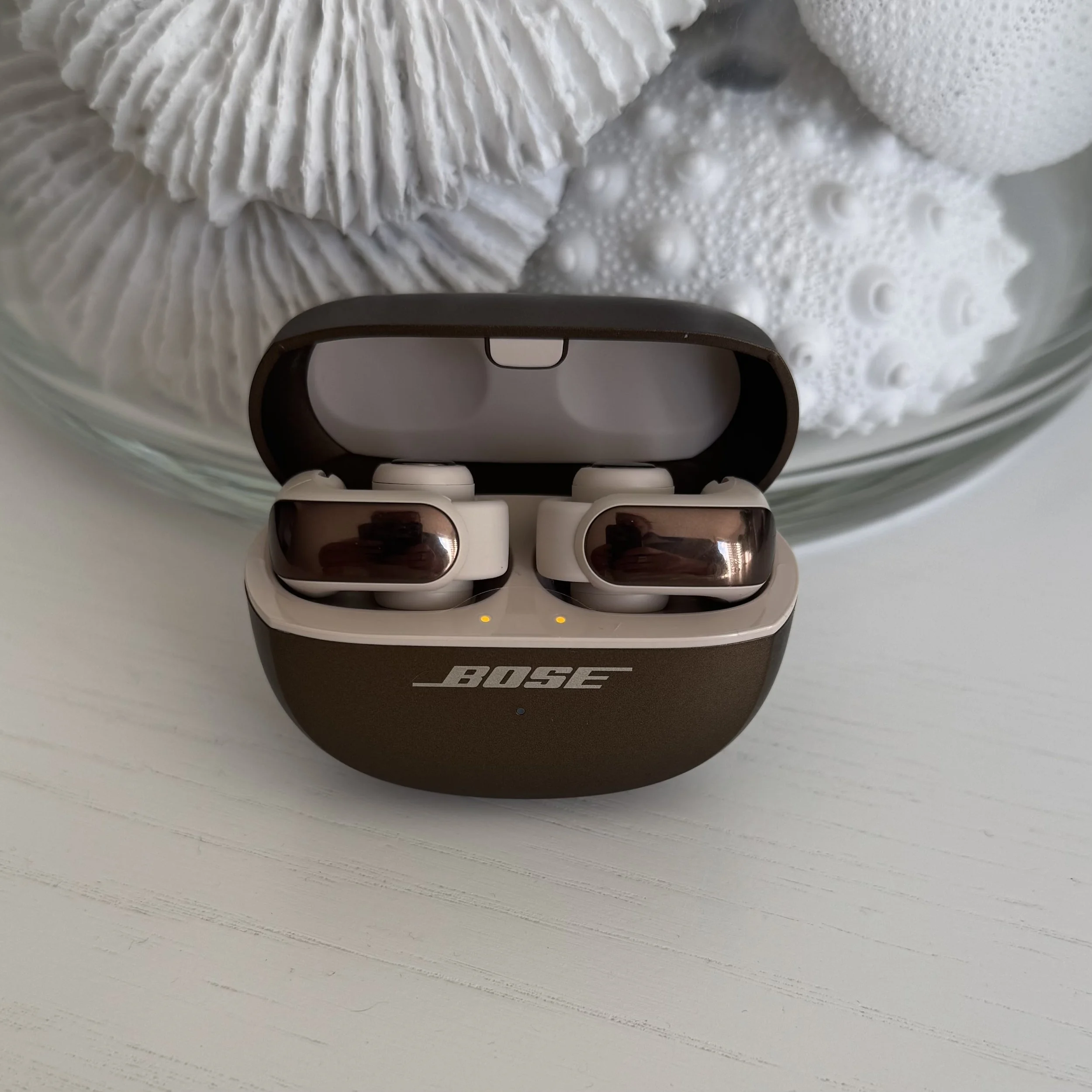 Bose Ultra Open Earbuds in the open charging case