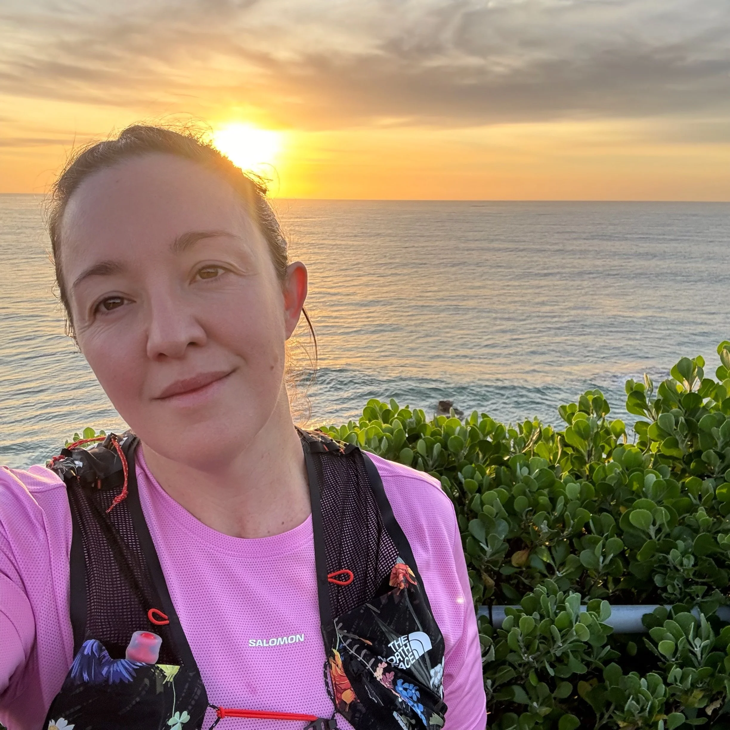Wearing the vest at sunrise on the coast