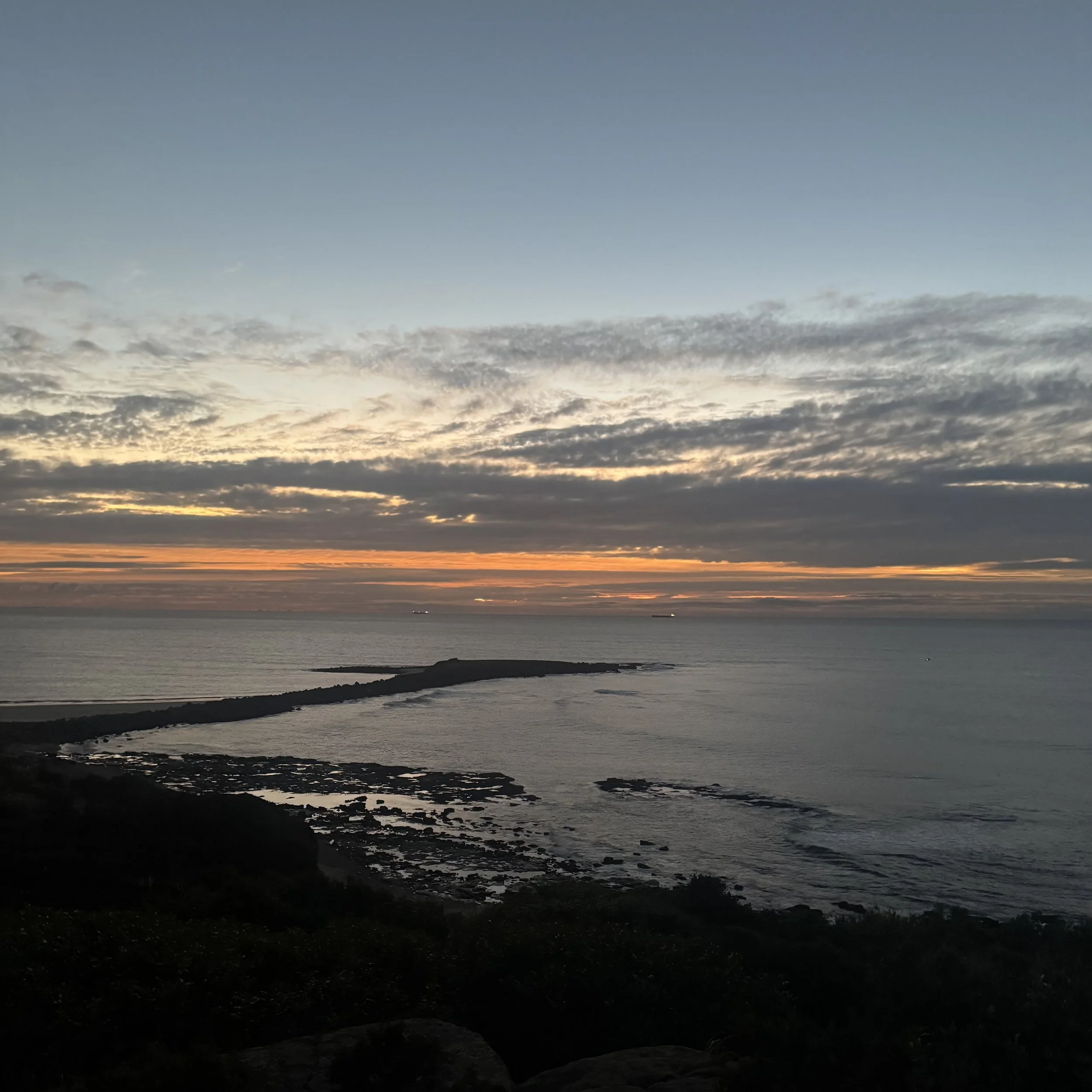 Sunrise over the breakwall