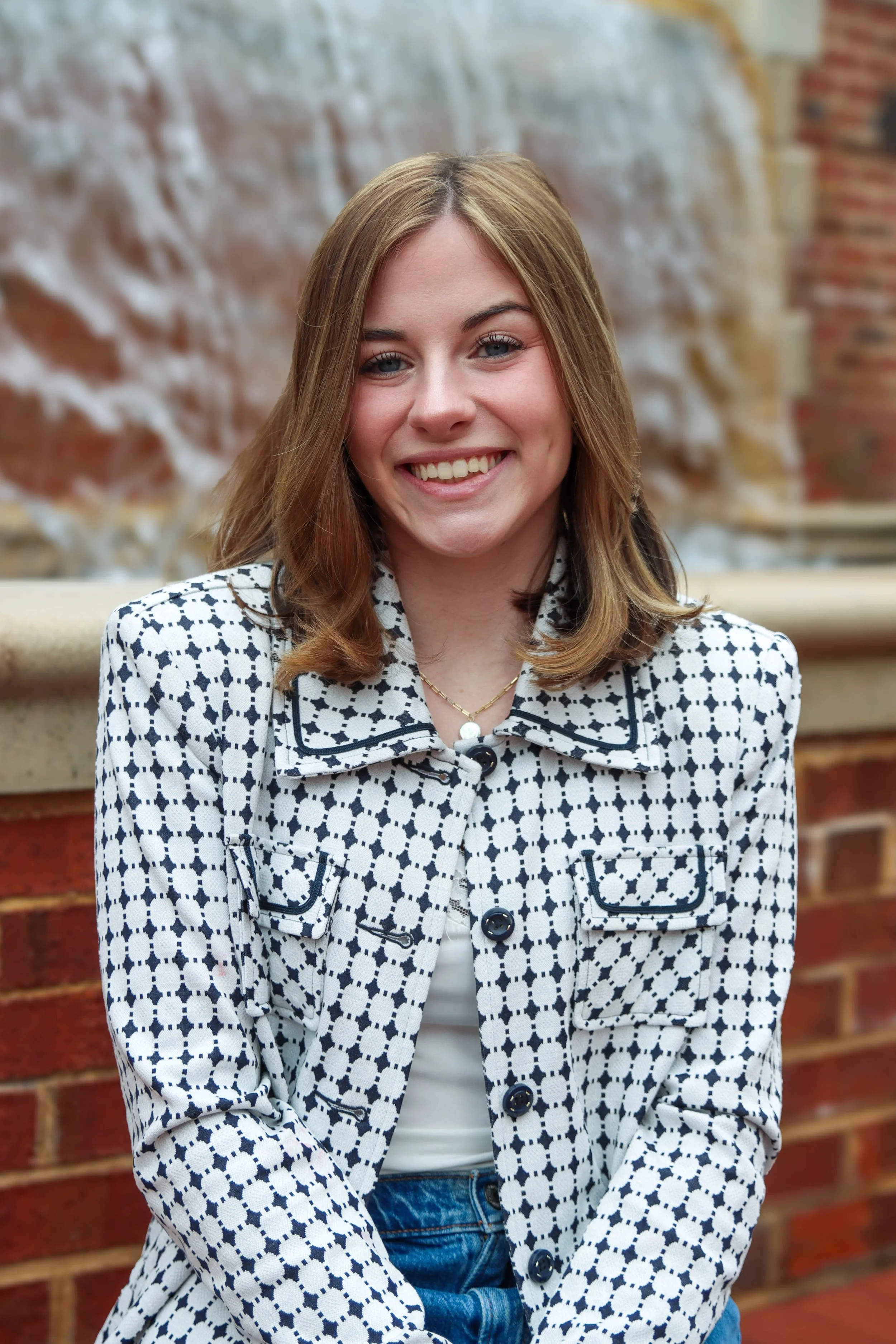 Lauren Schena Headshot_1.31.25_GREER-2.jpg